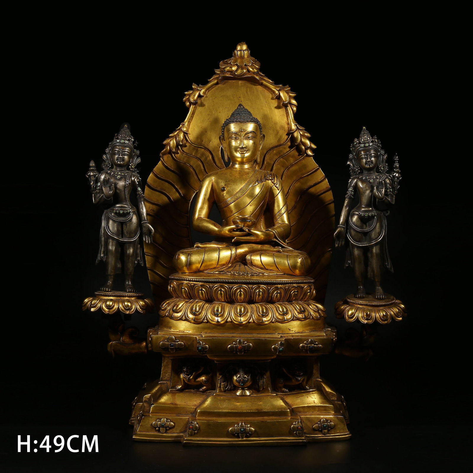 A GILT-BRONZE STATUE OF SHAKYAMUNI BUDDHA: Gilt-Bronze Statue of Shakyamuni Buddha