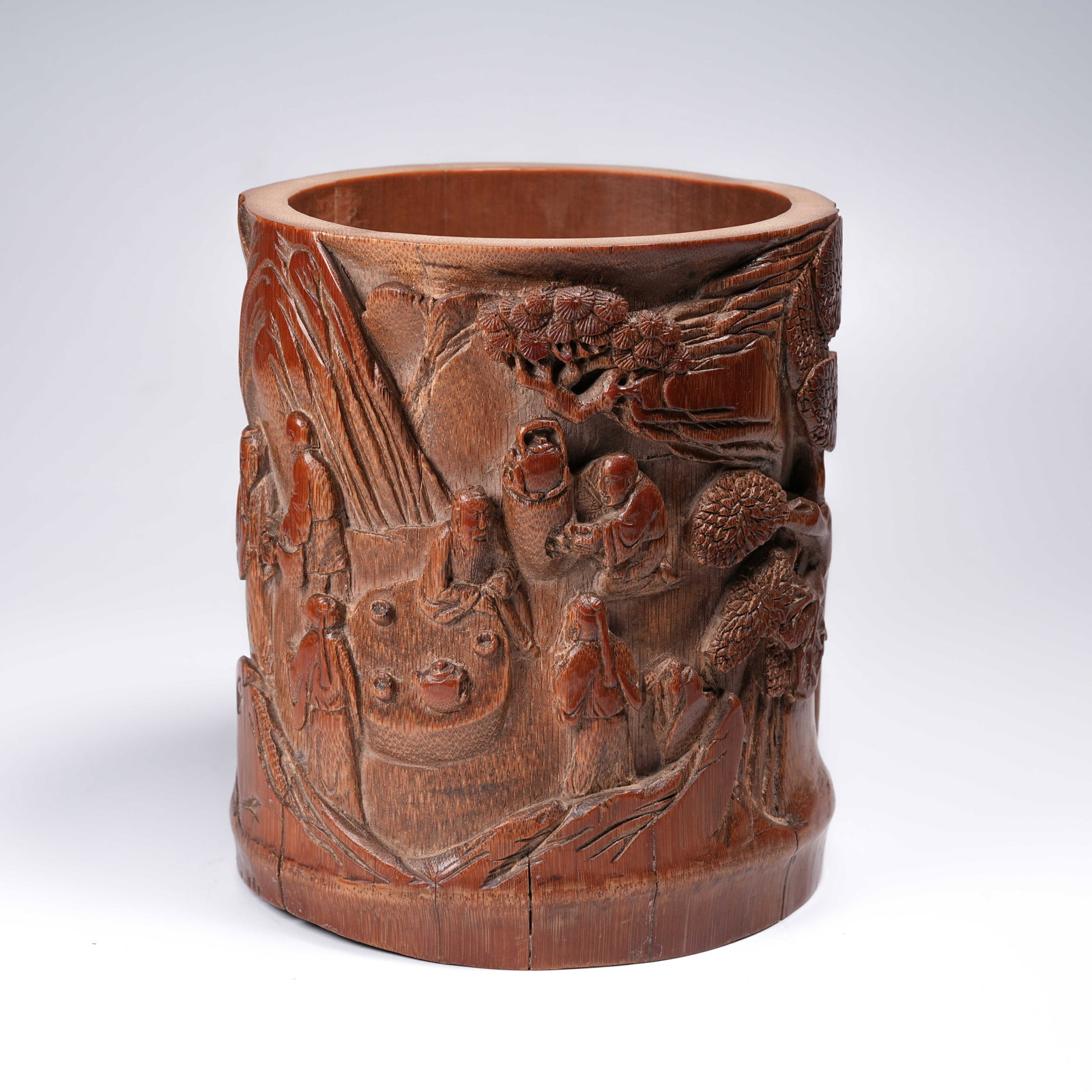A BAMBOO ROOT CARVED BRUSH HOLDER WITH "ELEGANT GATHERING UNDER THE PINES" SCENE (1 of 9)