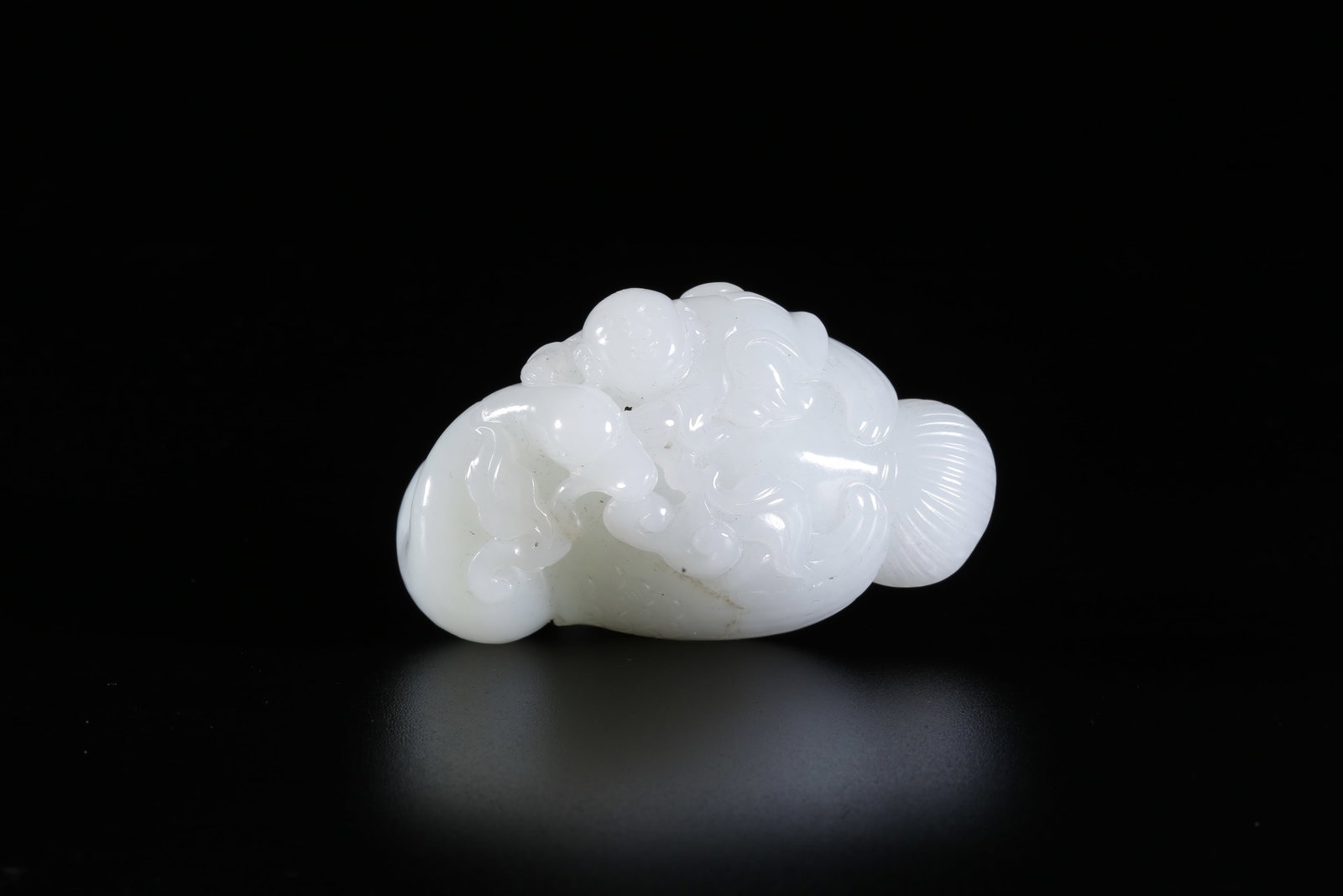 A HETIAN JADE CARVED "BOY PLAYING WITH GOOSE" ORNAMENT (1 of 8)