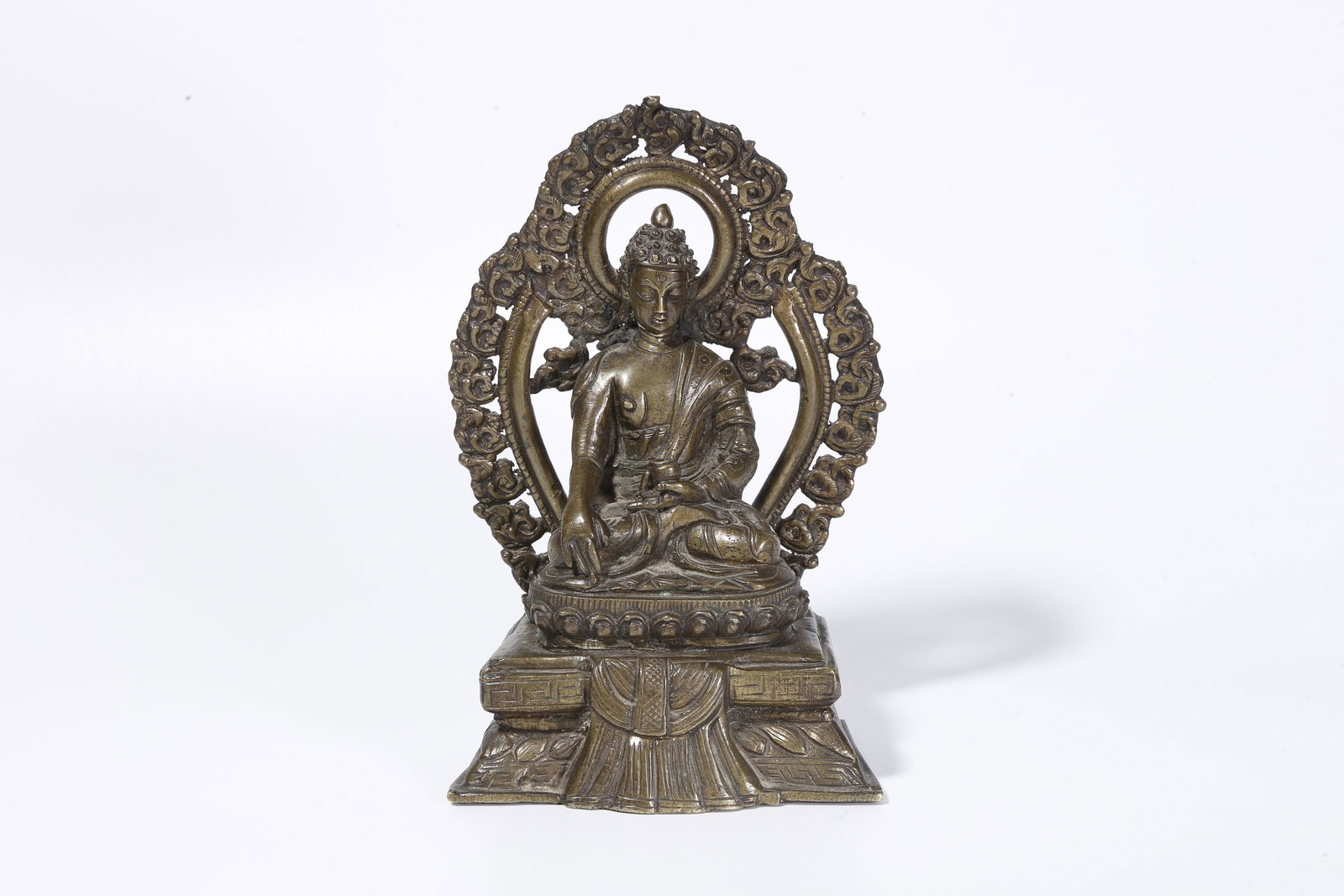 A BRONZE FIGURE OF SHAKYAMUNI (1 of 9)