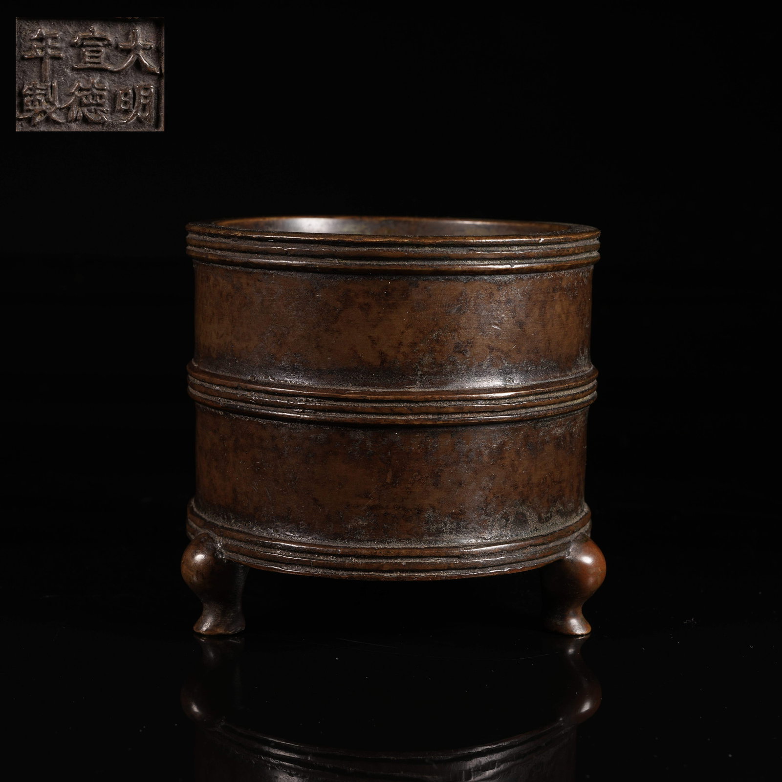 A BRONZE TRIPOD CYLINDRICAL CENSER: Bronze Tripod Cylindrical Censer