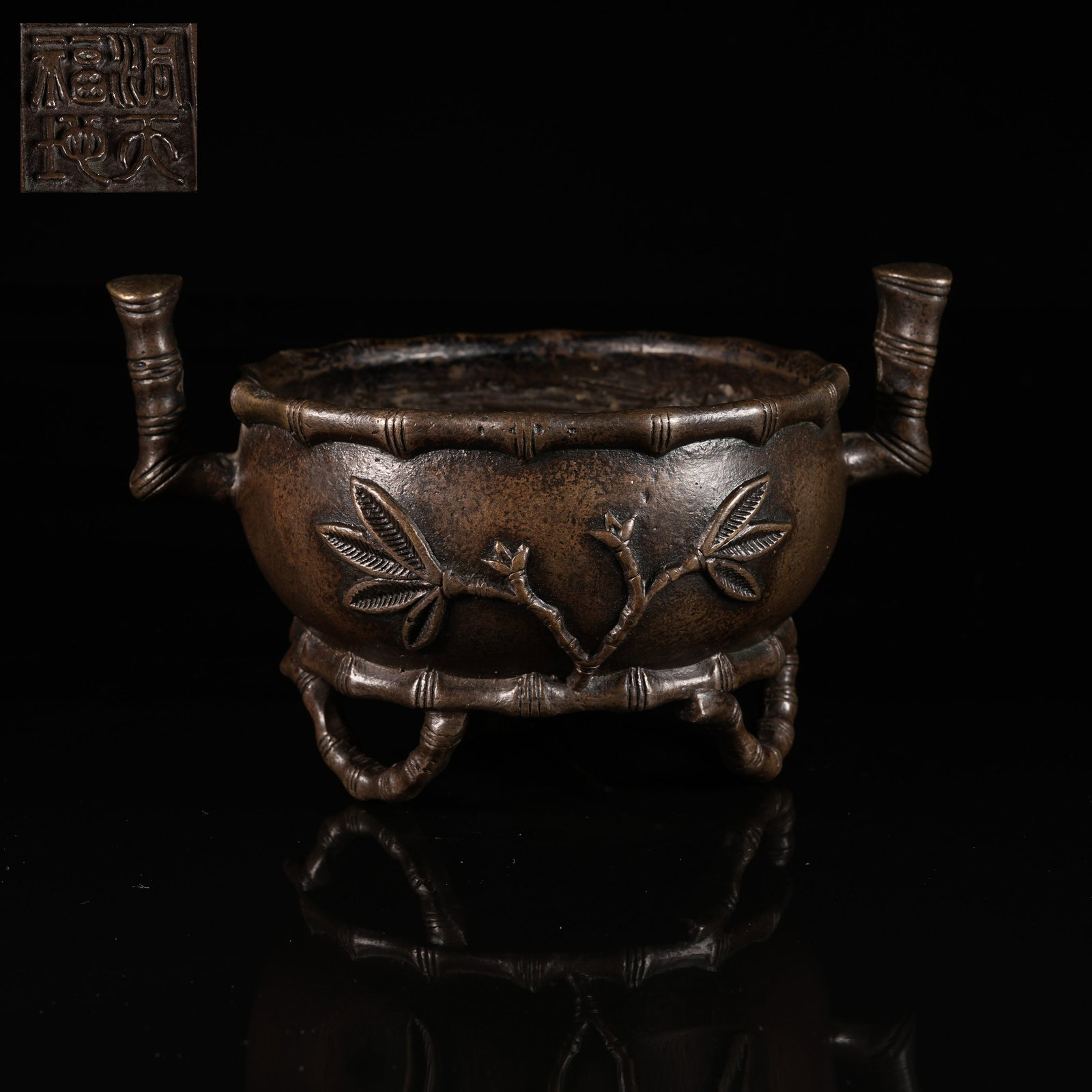 A BRONZE TRIPOD CENSER WITH BAMBOO-FORM LEGS AND UPRIGHT LOOP HANDLES (1 of 8)