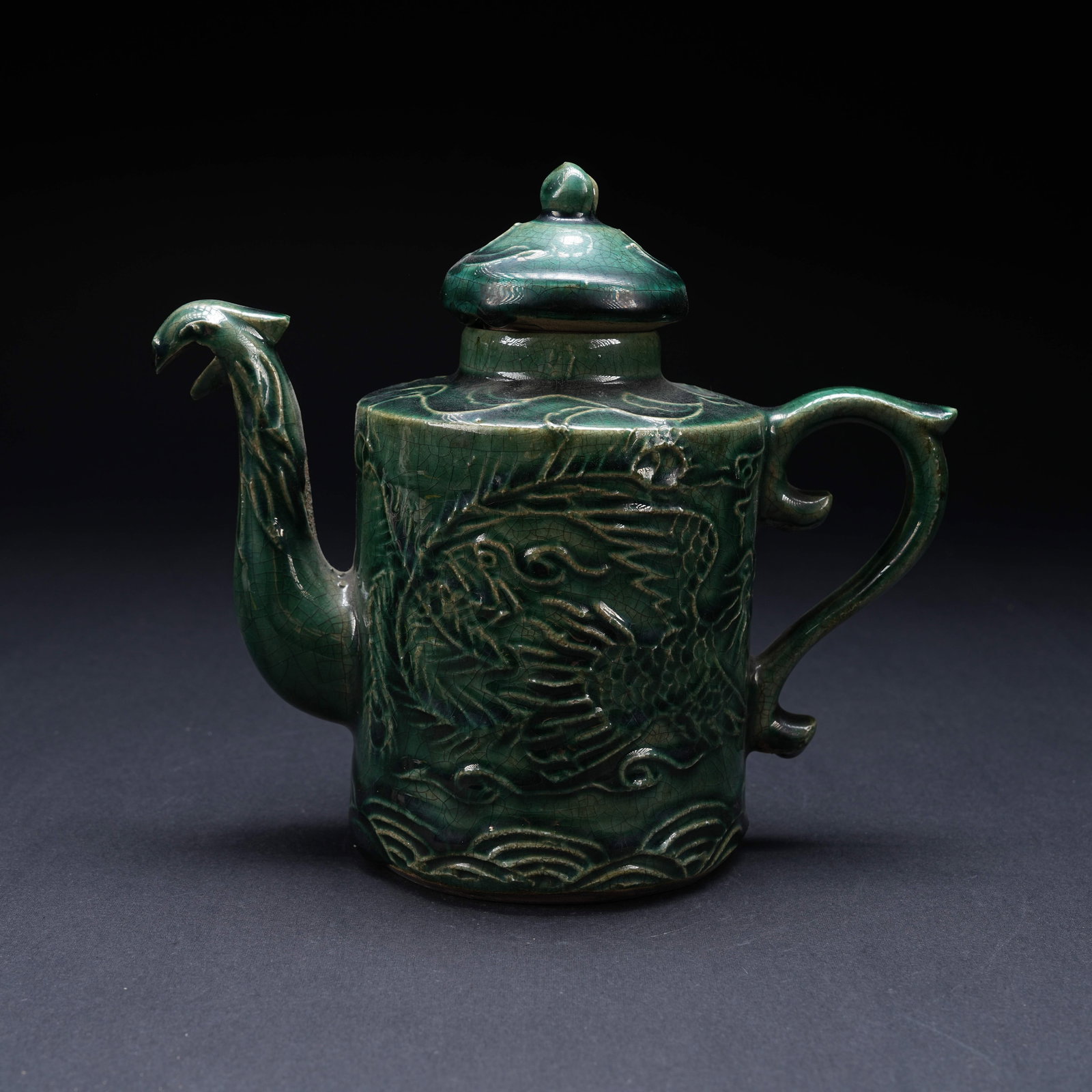 A GREEN GLAZED DRAGON PATTERN EWER WITH PHOENIX FINIAL (1 of 9)