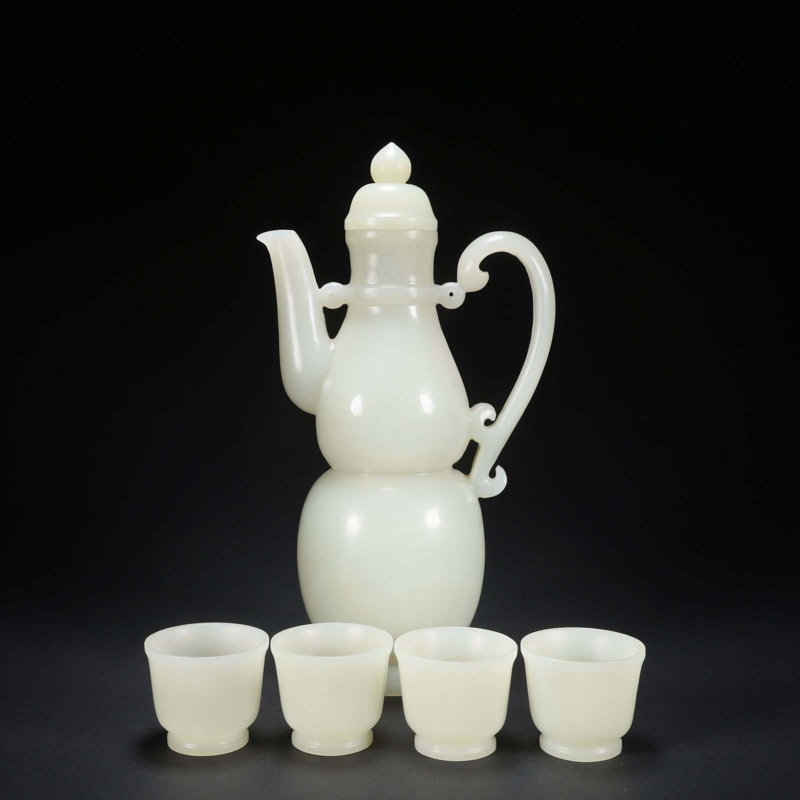 A HETIAN JADE GOURD-SHAPED WINE VESSEL SET (1 of 9)