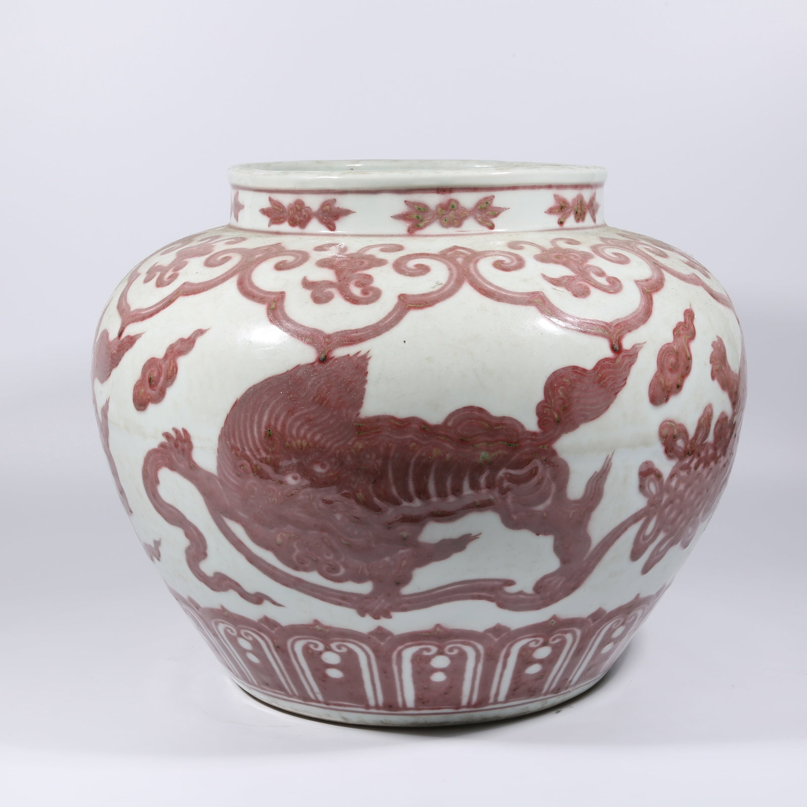 A UNDERGLAZE RED LARGE JAR WITH TWO LIONS PLAYING WITH A BALL DESIGN (1 of 9)