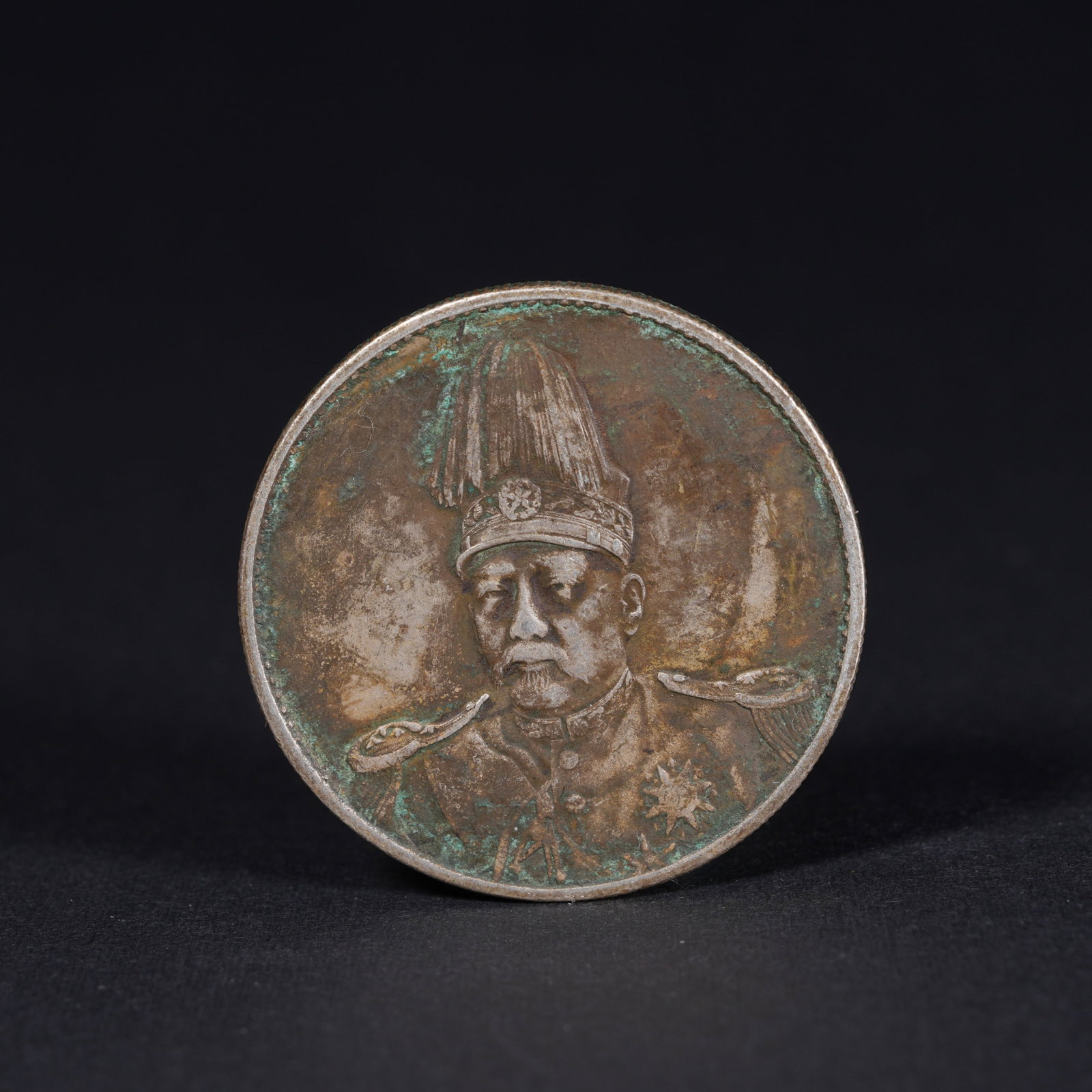 A SILVER DOLLAR COIN - 2