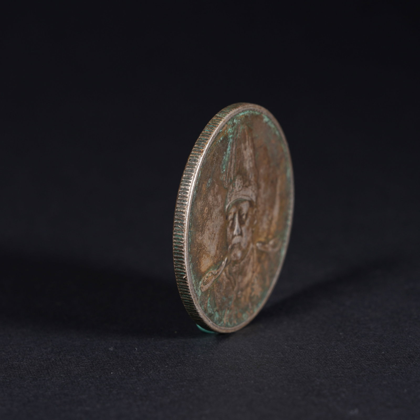 A SILVER DOLLAR COIN - 3