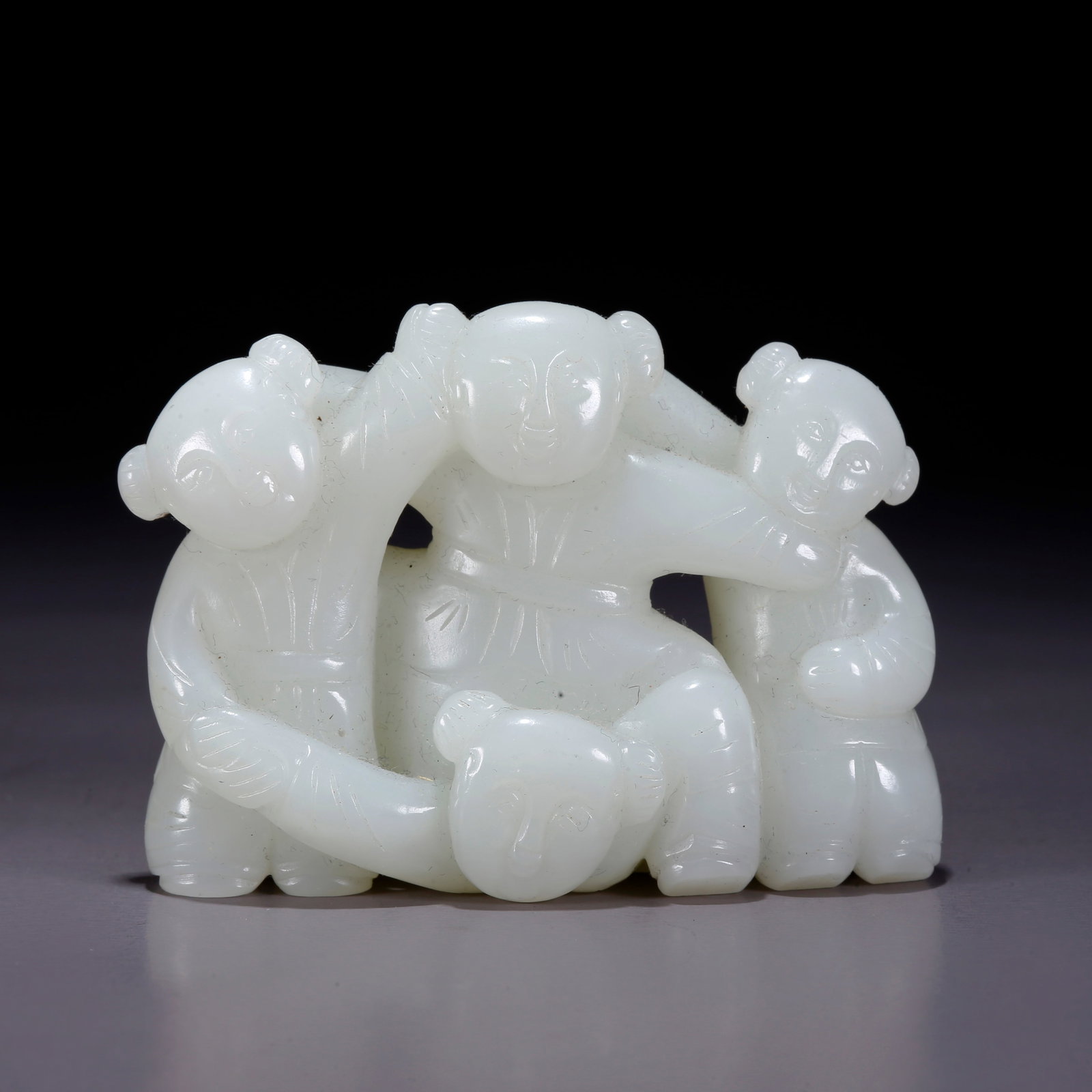 A HETIAN JADE CARVED CHILD ORNAMENT: Hetian Jade Carved Child Ornament