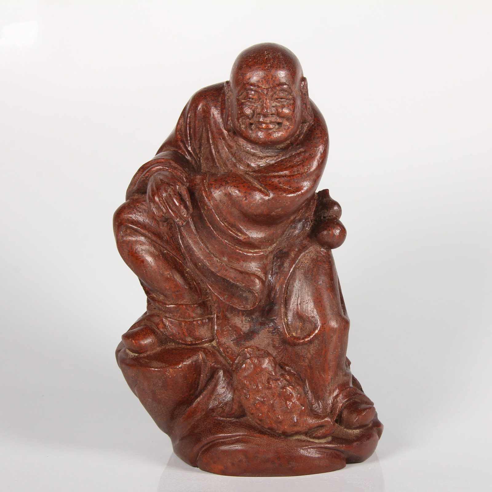 A BAMBOO ROOT CARVING OF LIU HAI PLAYING WITH GOLDEN TOAD (1 of 12)