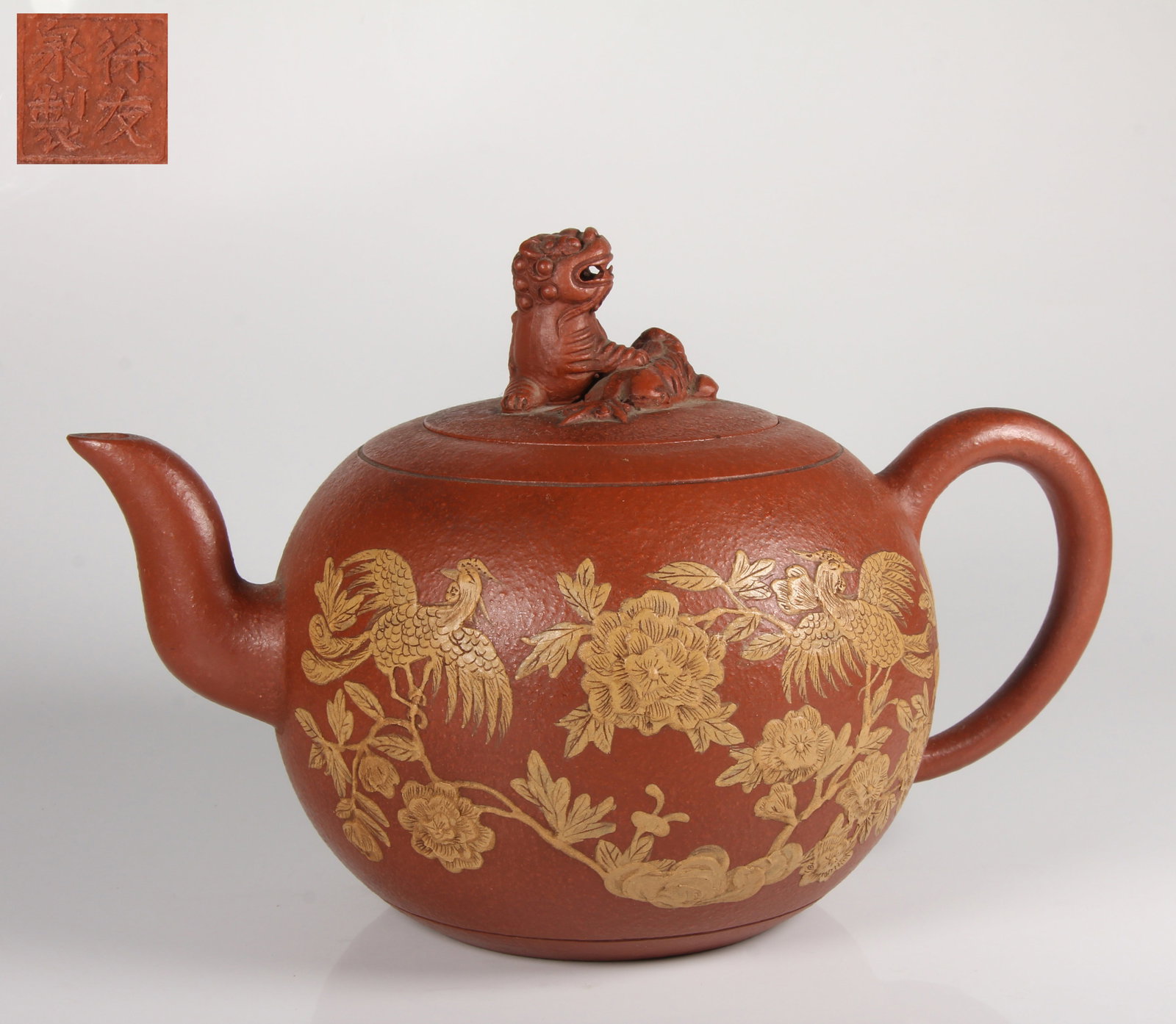 A PURPLE CLAY EWER WITH PIERCED FLORAL AND PHOENIX MOTIF: Purple Clay Ewer with Pierced Floral and Phoenix Motif