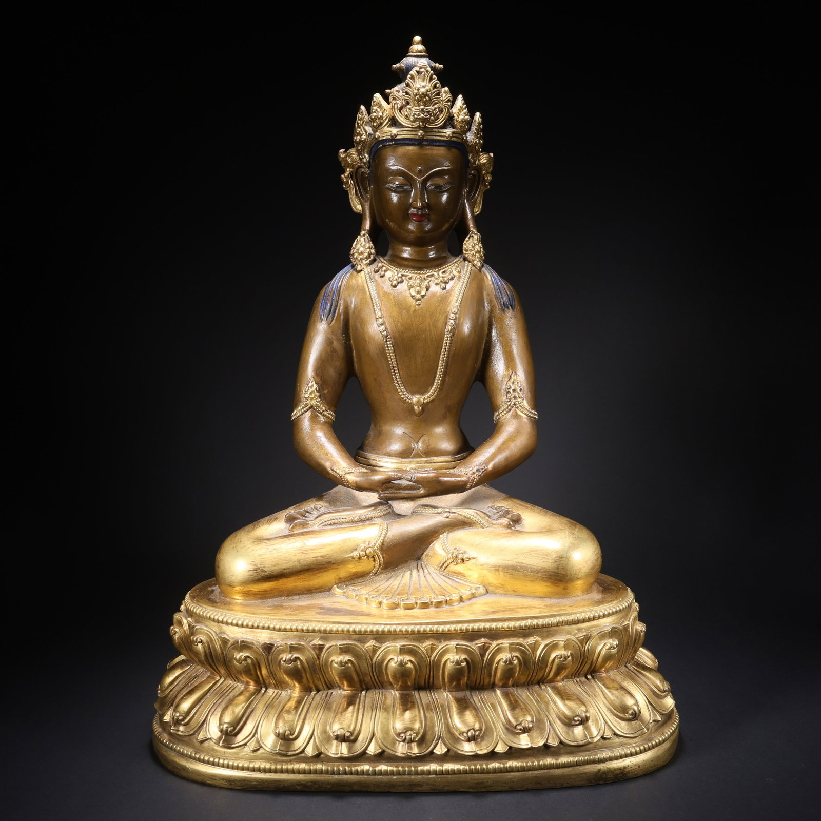 A GILT BRONZE LONGEVITY BUDDHA FIGURINE (1 of 9)