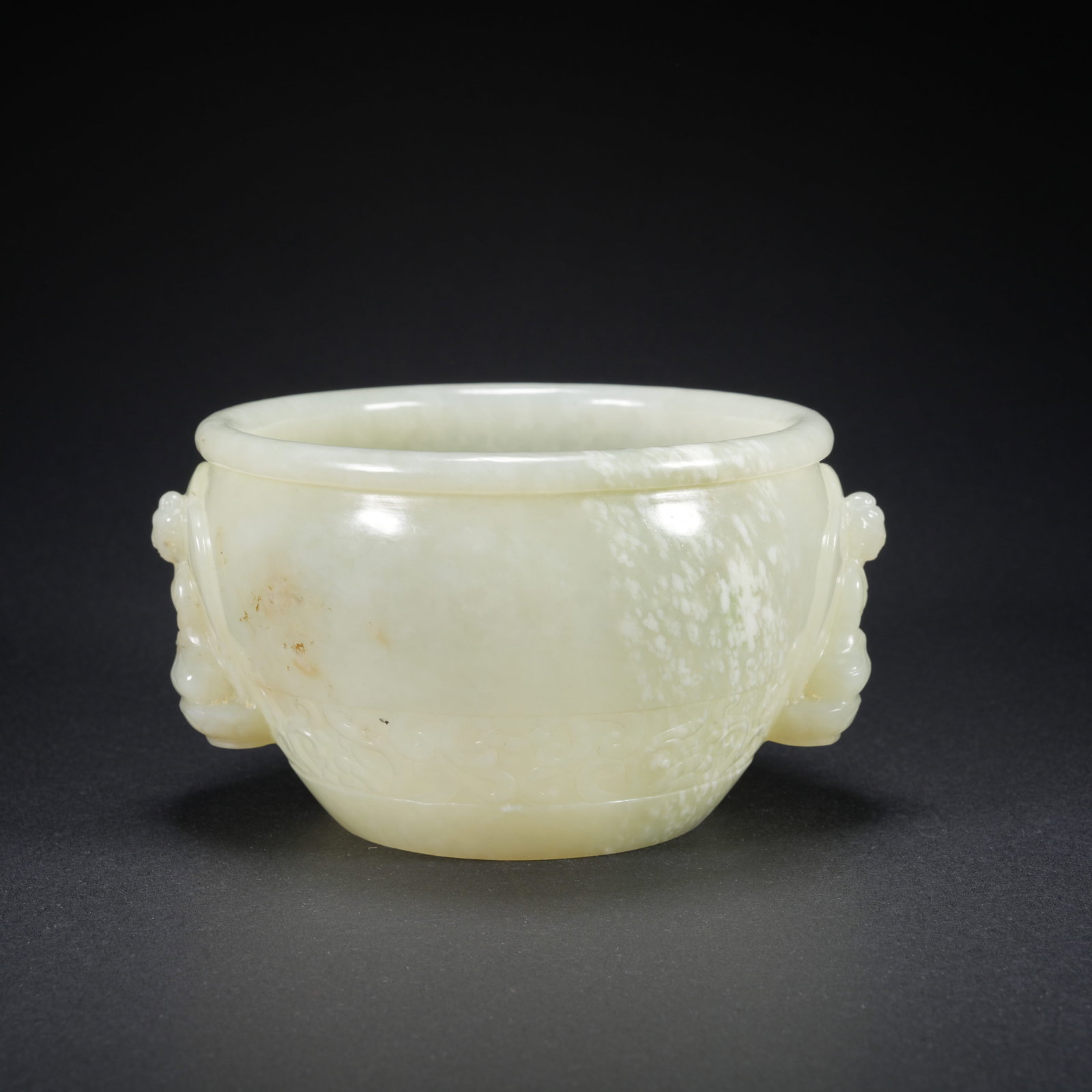 A HETIAN JADE CARVED JAR WITH BUDDHA MOTIF (1 of 10)