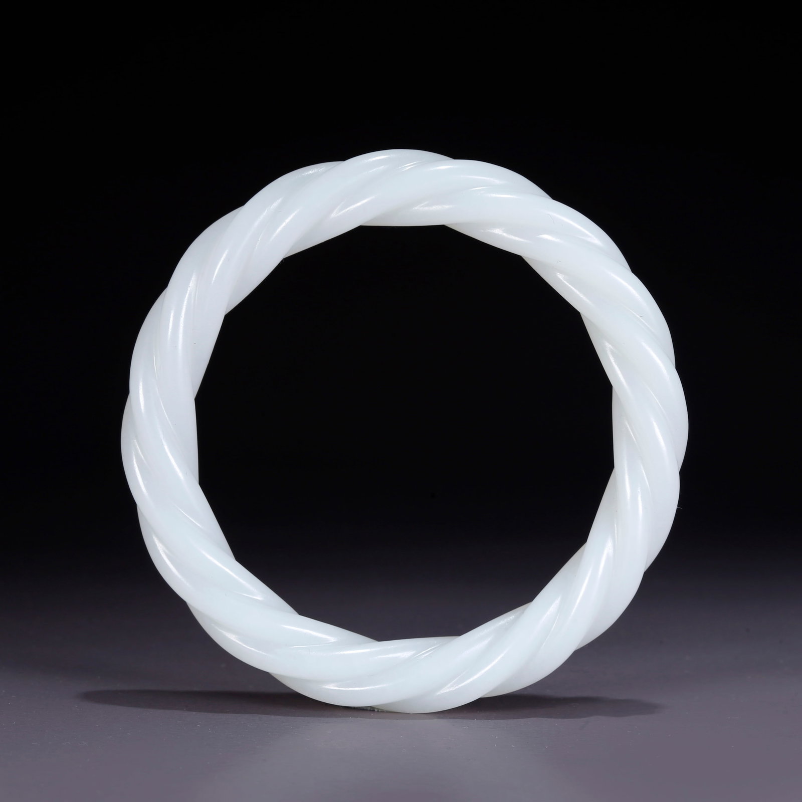 A HETIAN JADE CARVED BANGLE (1 of 9)