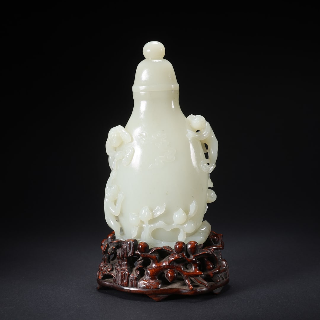 A HETIAN JADE BOY OFFERING LONGEVITY COVERED VASE (1 of 9)