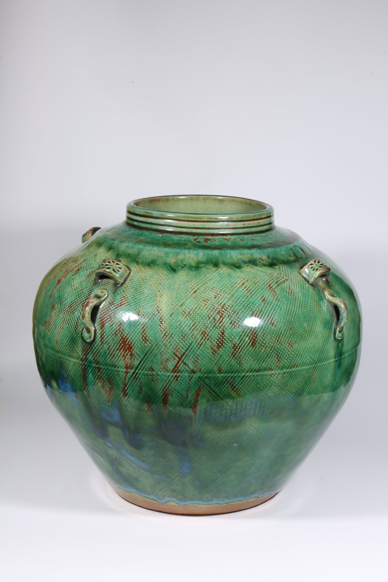 A GREEN-GLAZED FOUR-HANDLED JAR - 2