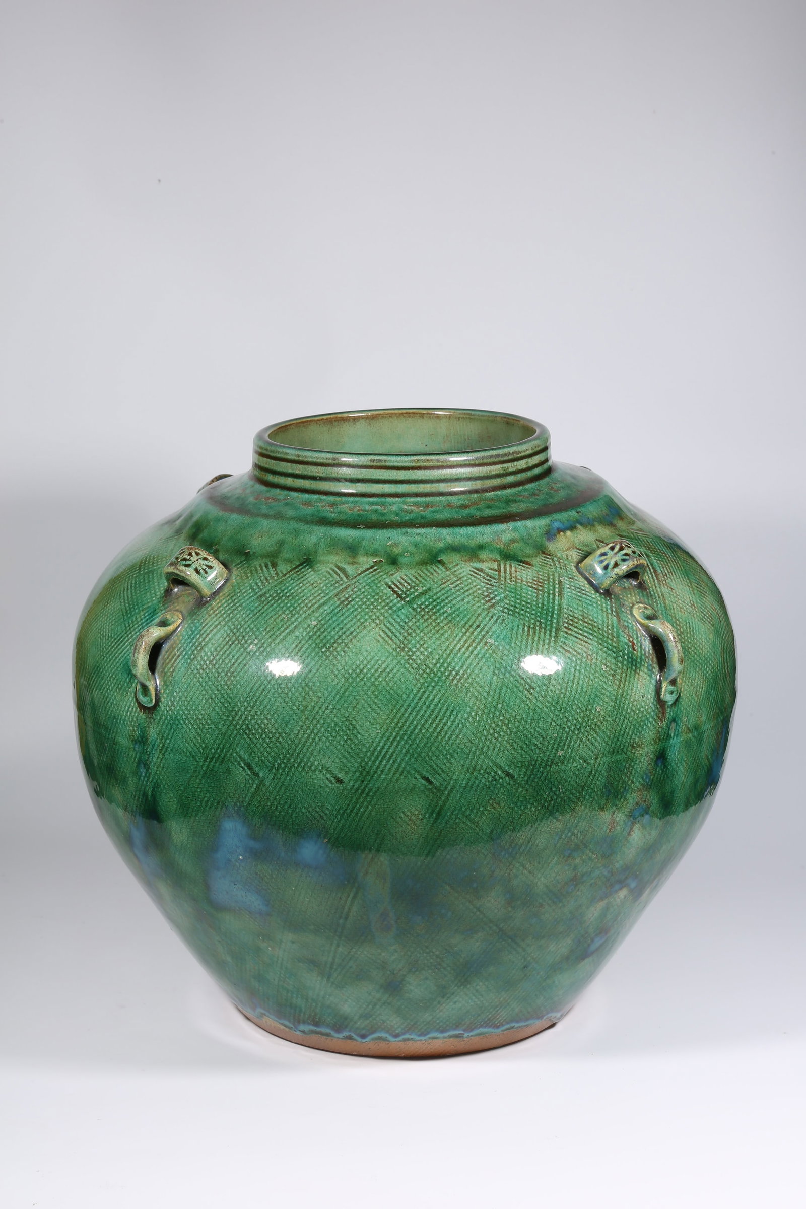 A GREEN-GLAZED FOUR-HANDLED JAR - 4