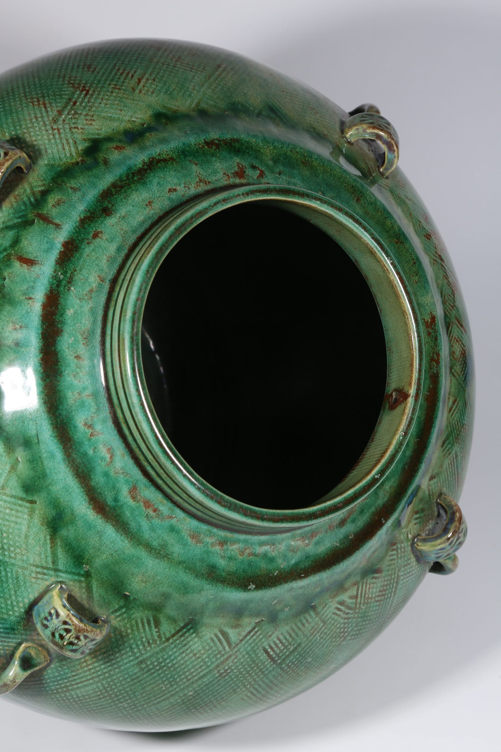 A GREEN-GLAZED FOUR-HANDLED JAR - 8