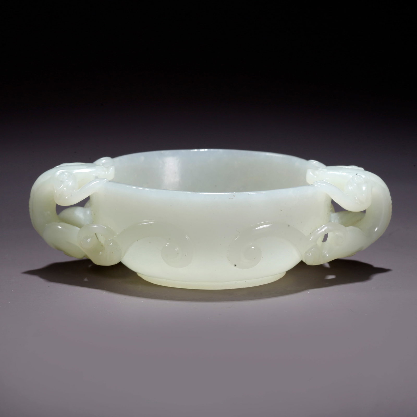 A HETIAN JADE DOUBLE-BEAST-HANDLED WASH BASIN (1 of 9)