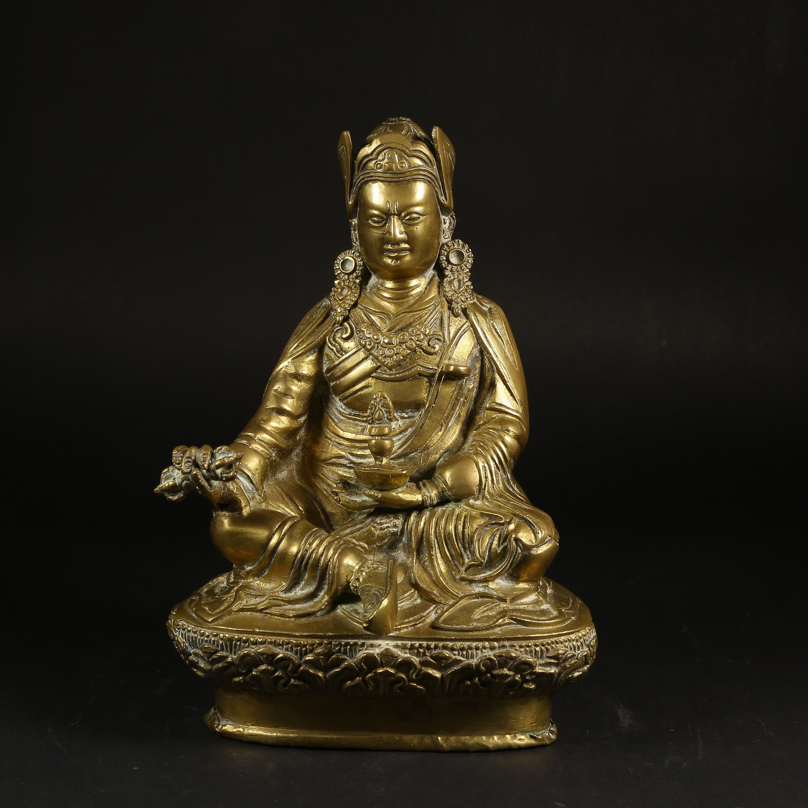 A GILT-BRONZE STATUE OF PADMASAMBHAVA (1 of 9)