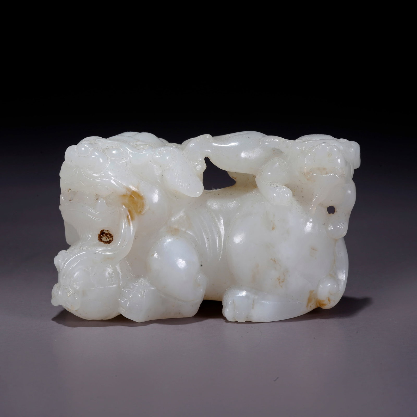 A HETIAN JADE CARVED LION ROLLING BALL ORNAMENT (1 of 9)