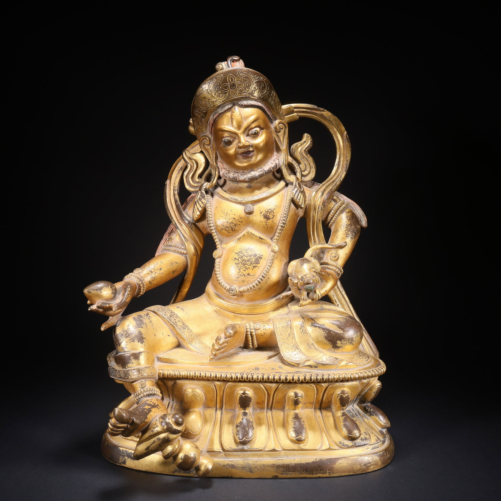 A GILT BRONZE TIBETAN GOD OF WEALTH (1 of 9)