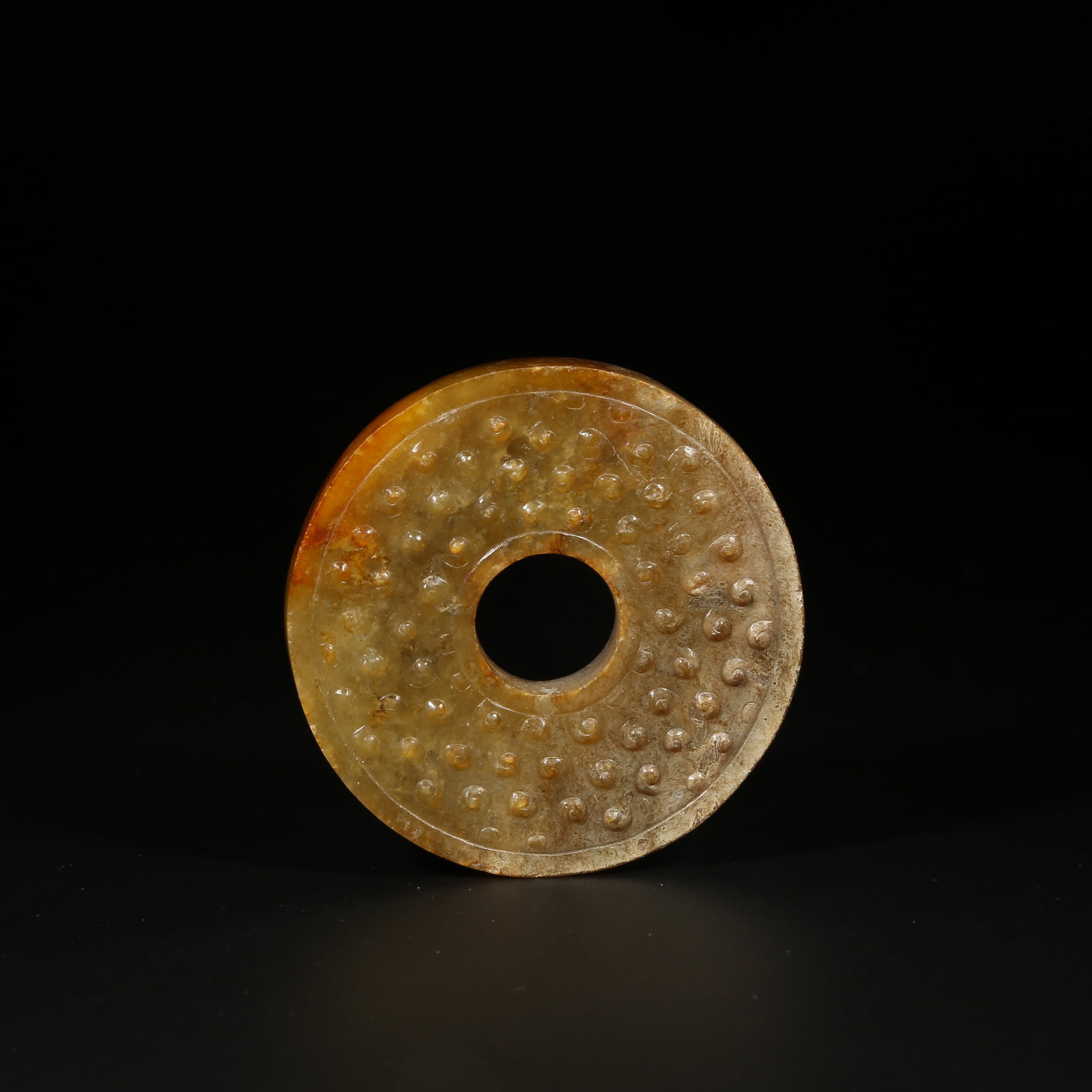 A ANCIENT JADE BI DISK WITH GRAIN PATTERN (1 of 8)