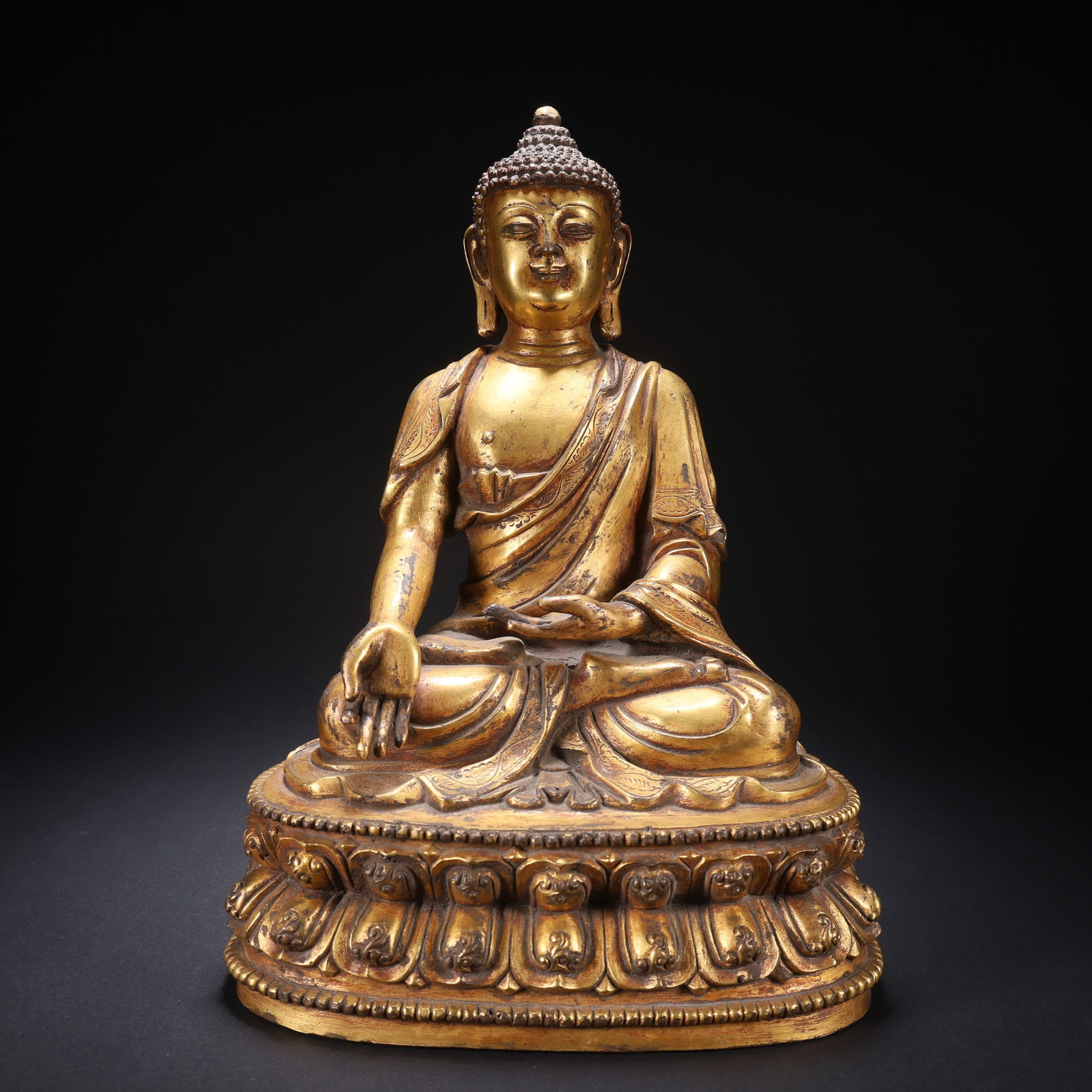 A GILT-COPPER SHAKYAMUNI BUDDHA FIGURE (1 of 9)