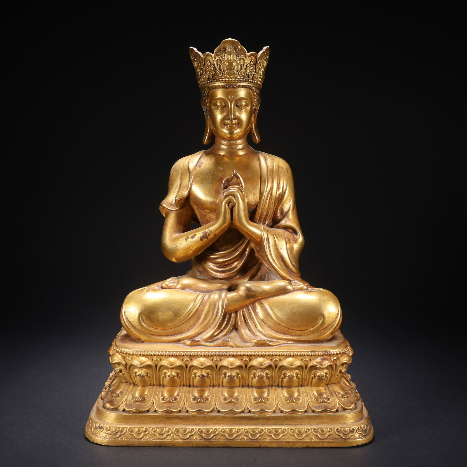 A GILT-COPPER VAIROCANA BUDDHA FIGURE: Gilt-Copper Vairocana Buddha Figure