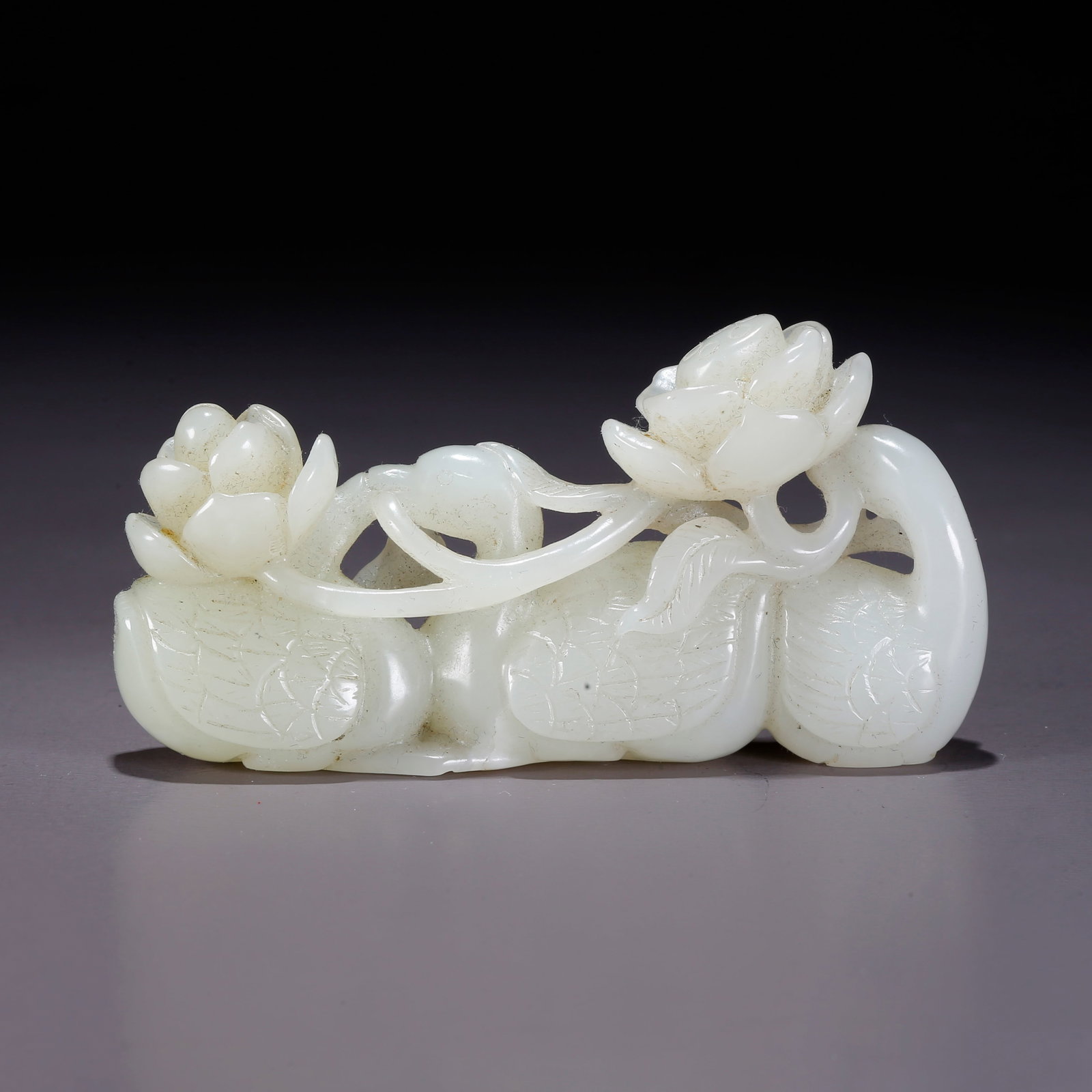 A HETIAN JADE CARVED TREASURE GOOSE PIERCING LOTUS ORNAMENT (1 of 9)