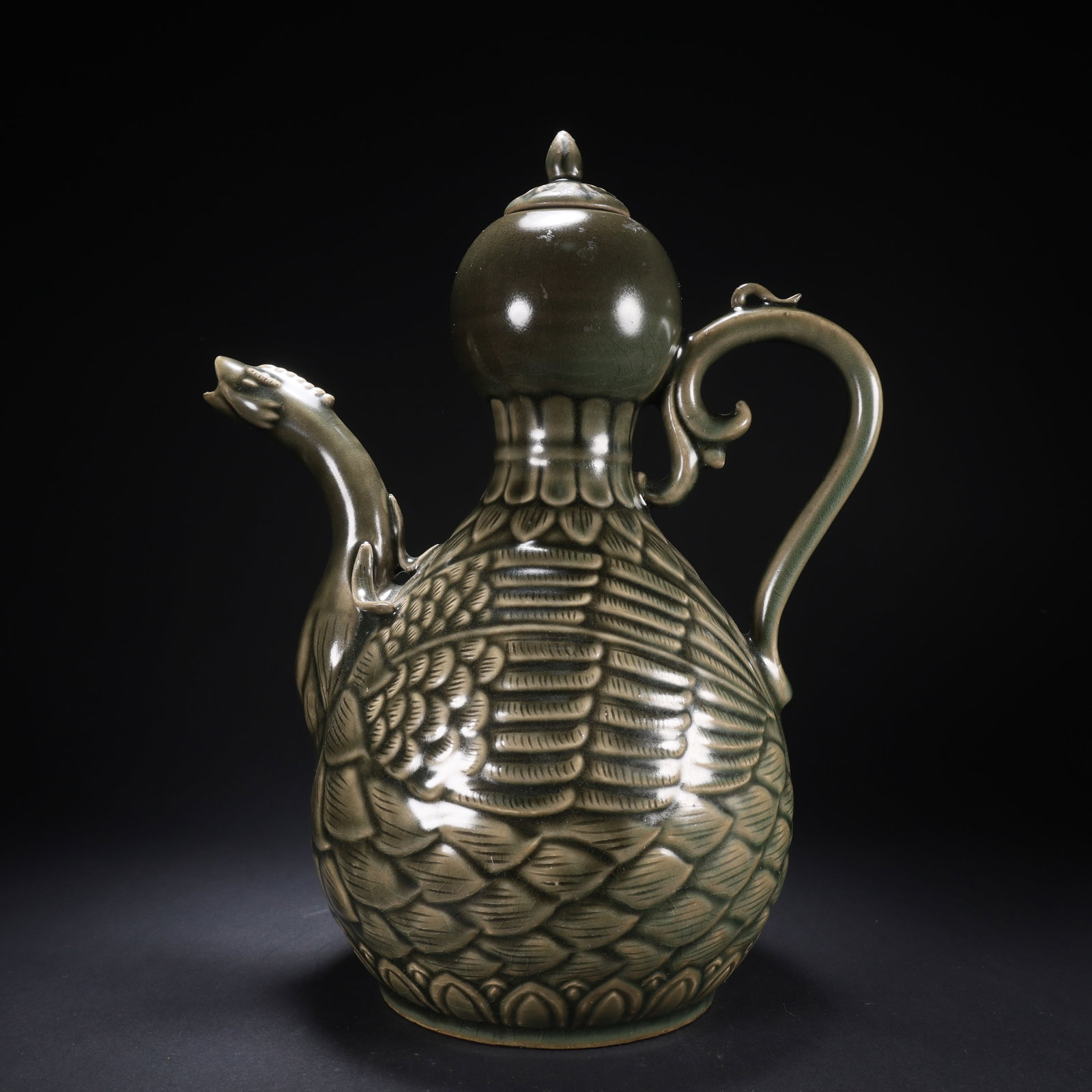 A GORYEO PORCELAIN DRAGON-HEAD HANDLING TEAPOT (1 of 9)