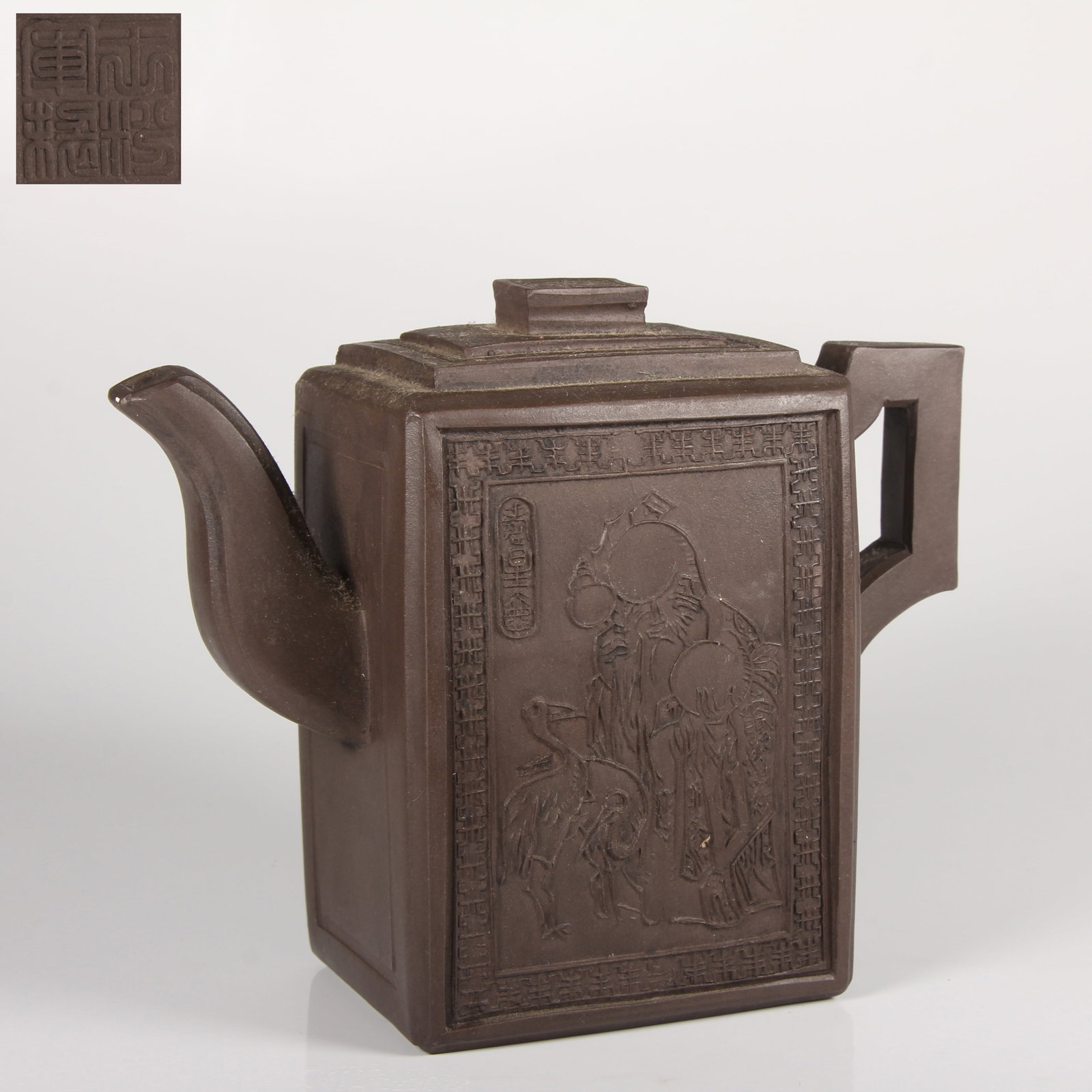 A PURPLE CLAY SHOUXING (GOD OF LONGEVITY) EWER: Purple Clay Shouxing (God of Longevity) Ewer