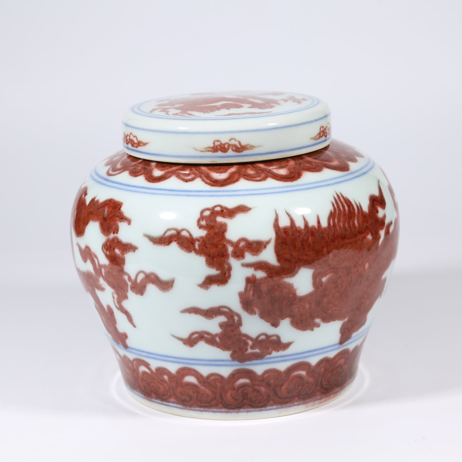 A UNDERGLAZE RED TIAN-ZI JAR WITH CLOUD AND DRAGON MOTIF (1 of 9)