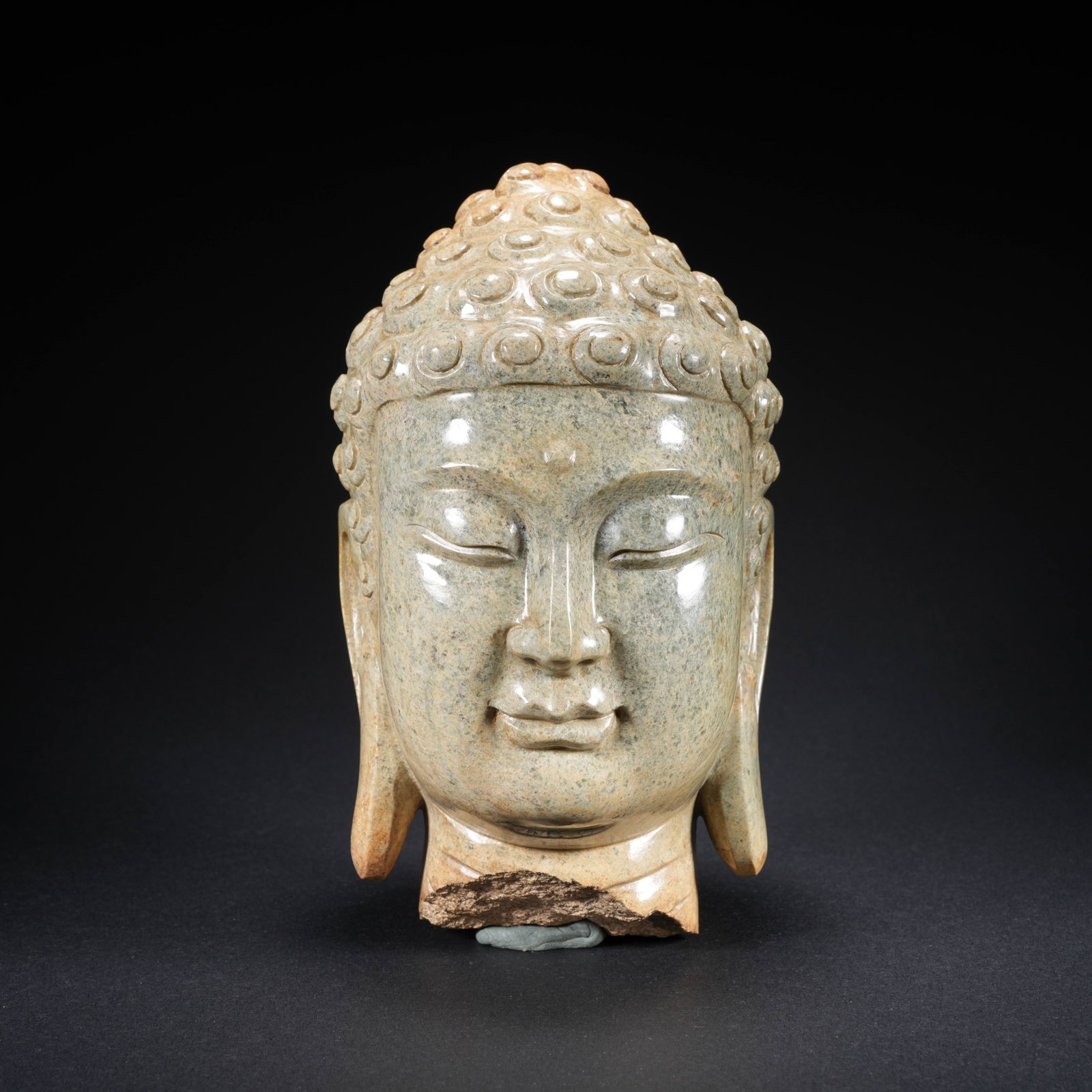 A HETIAN JADE CARVED BUDDHA HEAD (1 of 10)