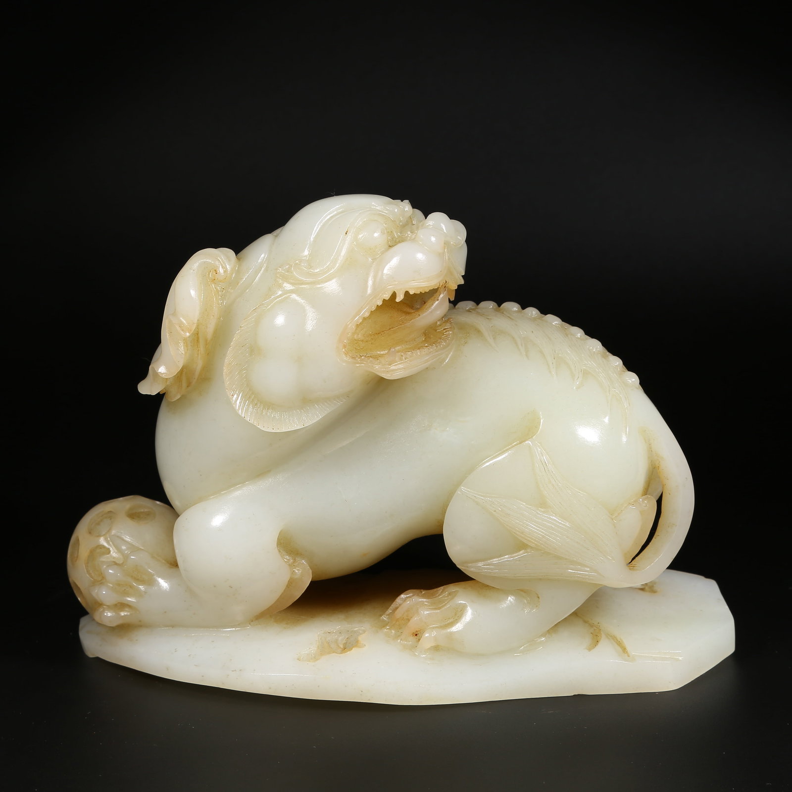 A HETIAN WHITE JADE LION PLAYING WITH EMBROIDERED BALL ORNAMENT (1 of 8)