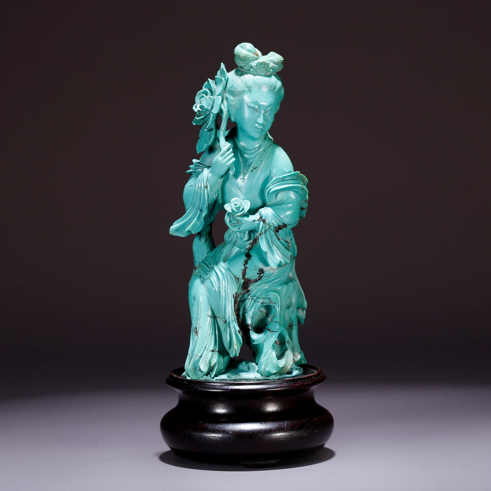 A TURQUOISE CARVED FIGURE ORNAMENT (1 of 9)