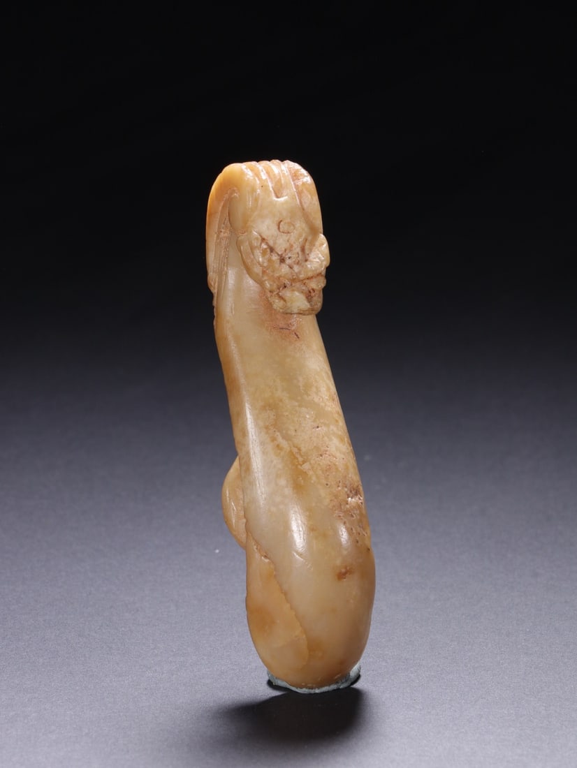 A SONG-DYNASTY DRAGON-HEAD BELT FITTING (1 of 10)