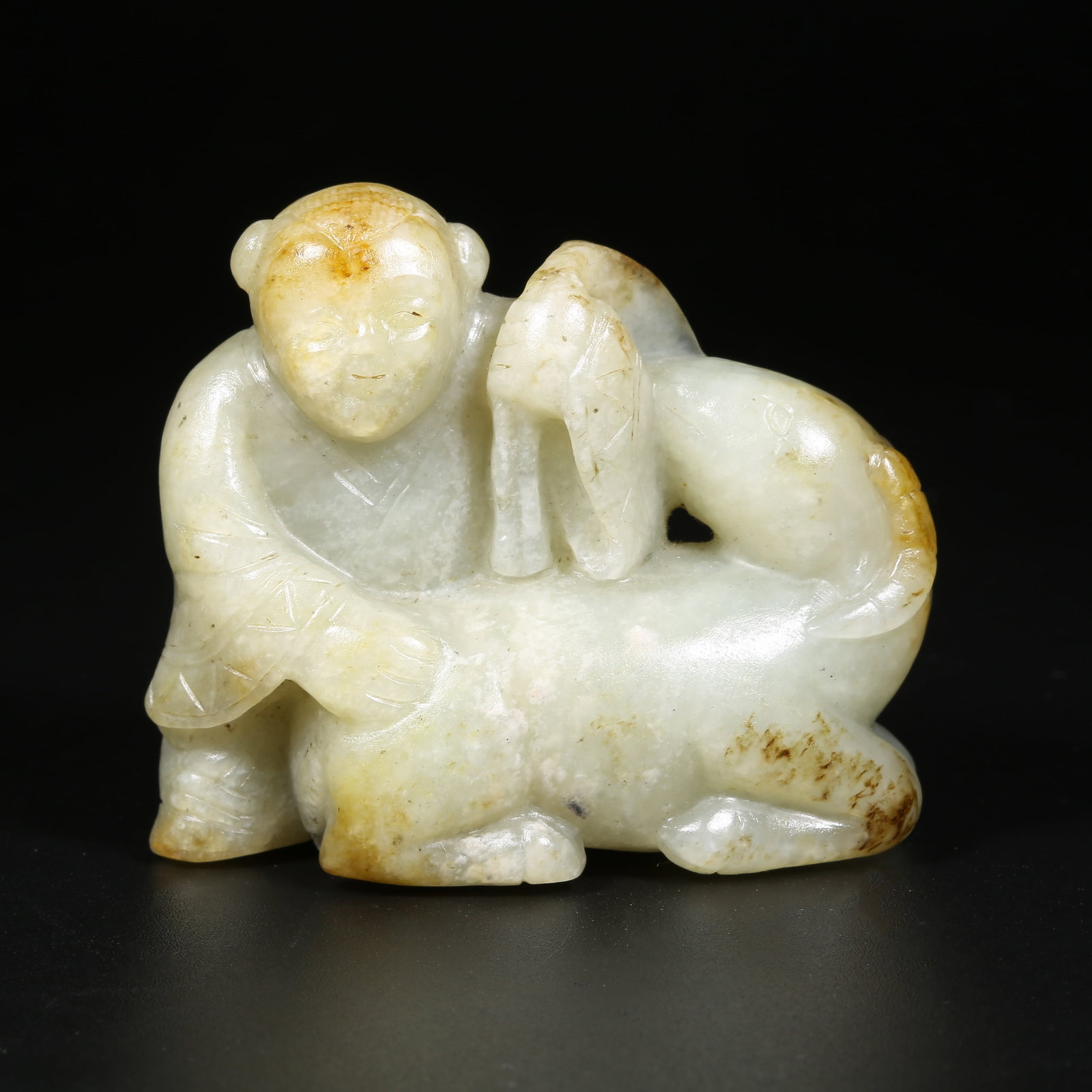A HETIAN JADE CHILD PLAYING WITH DEER ORNAMENT (1 of 7)