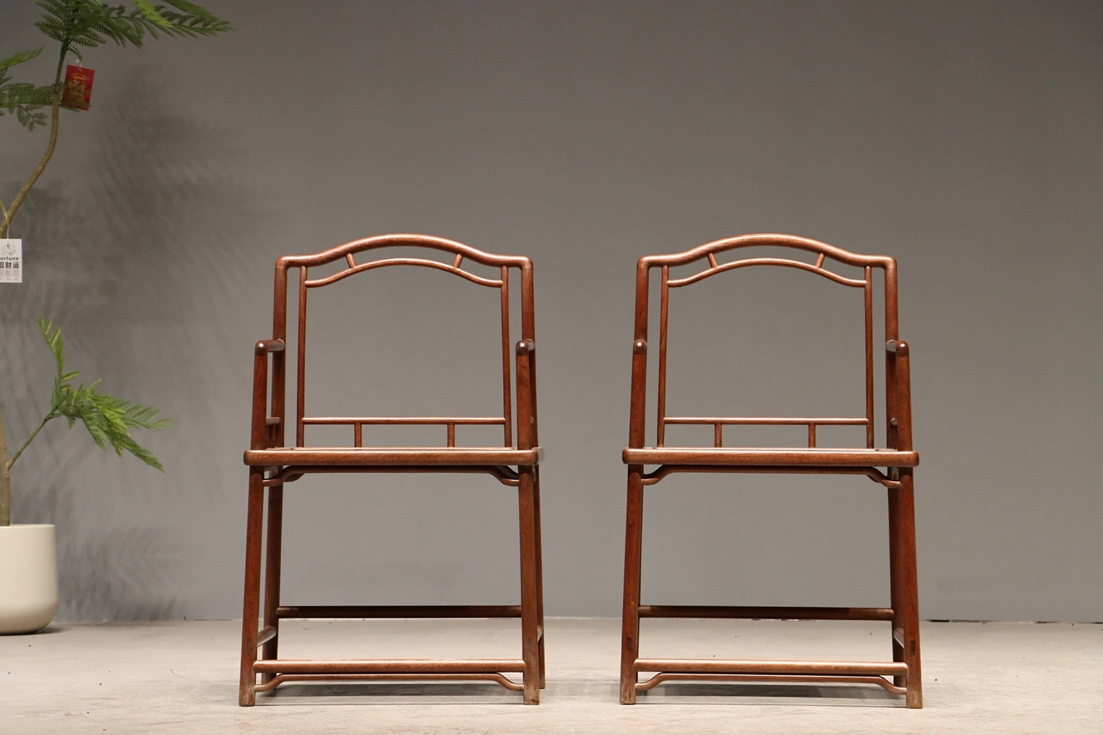 A HUANGHUALI ROSE CHAIR: Huanghuali rose chair