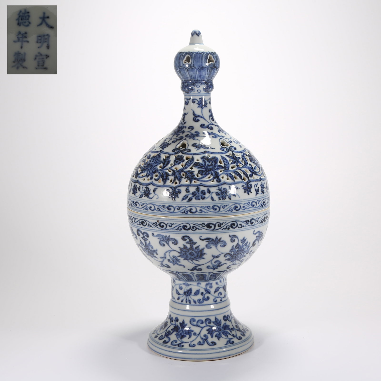 A BLUE-AND-WHITE OPENWORK INCENSE BURNER WITH SCROLLING FLORAL DESIGN (1 of 9)