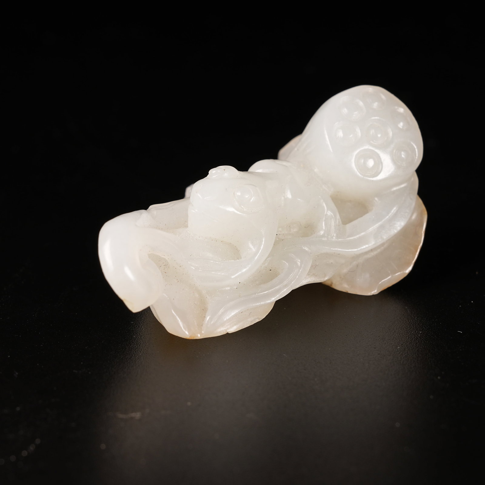 A HETIAN JADE "QUACK FOR WEALTH" PENDANT (1 of 8)