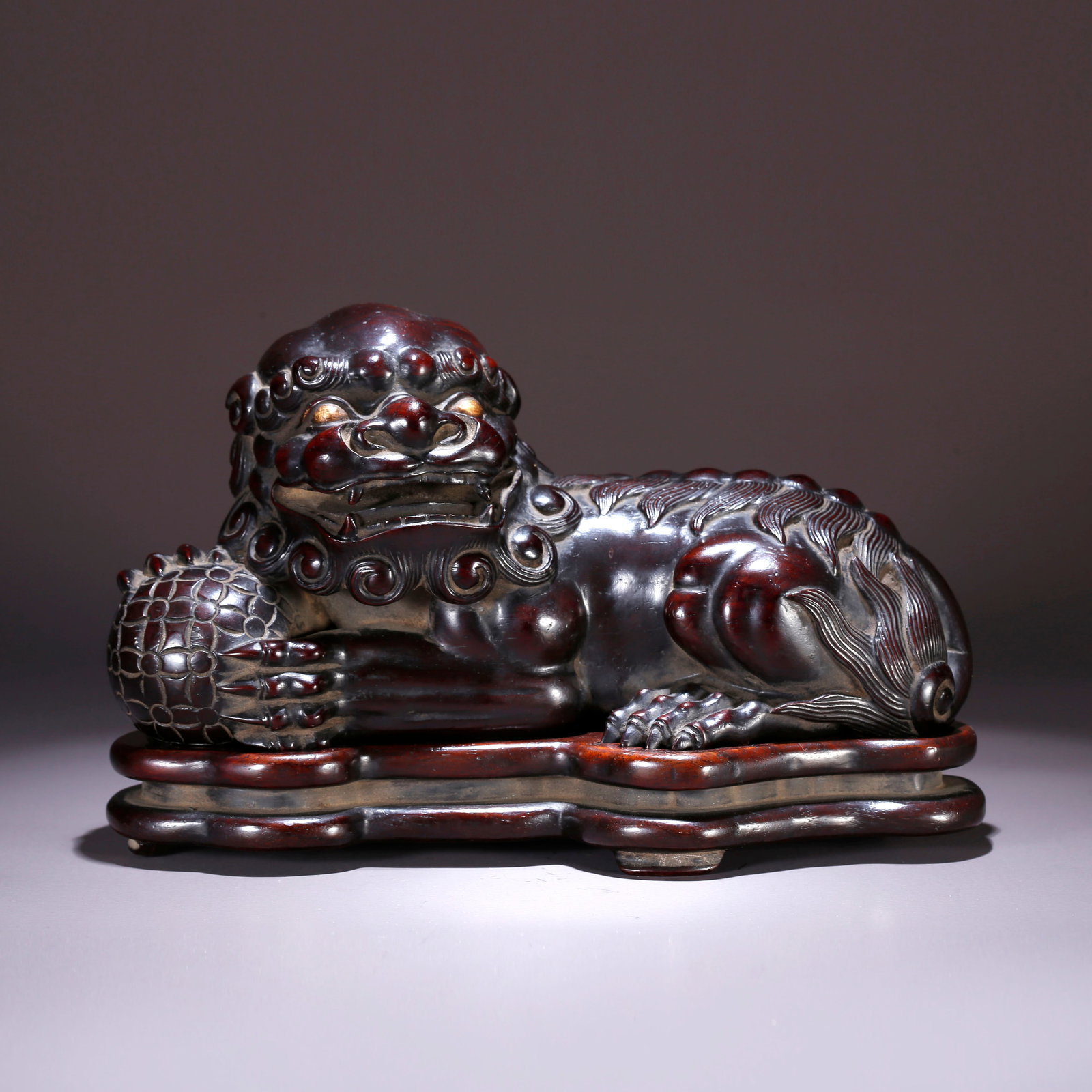 A ZITAN WOOD CARVING OF LION PLAYING WITH BALL ORNAMENT (1 of 10)