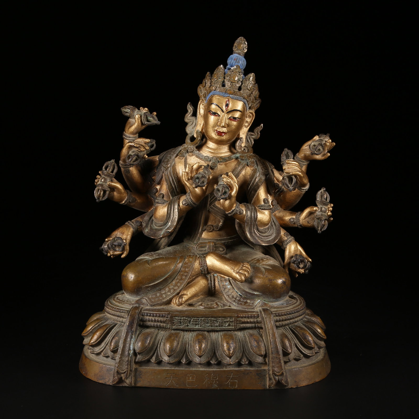 A GILT AND BRONZE ALLOY SIX-TIERED BUDDHIST TOWER STYLE RIGHT MUBA DEITY STATUE (1 of 8)