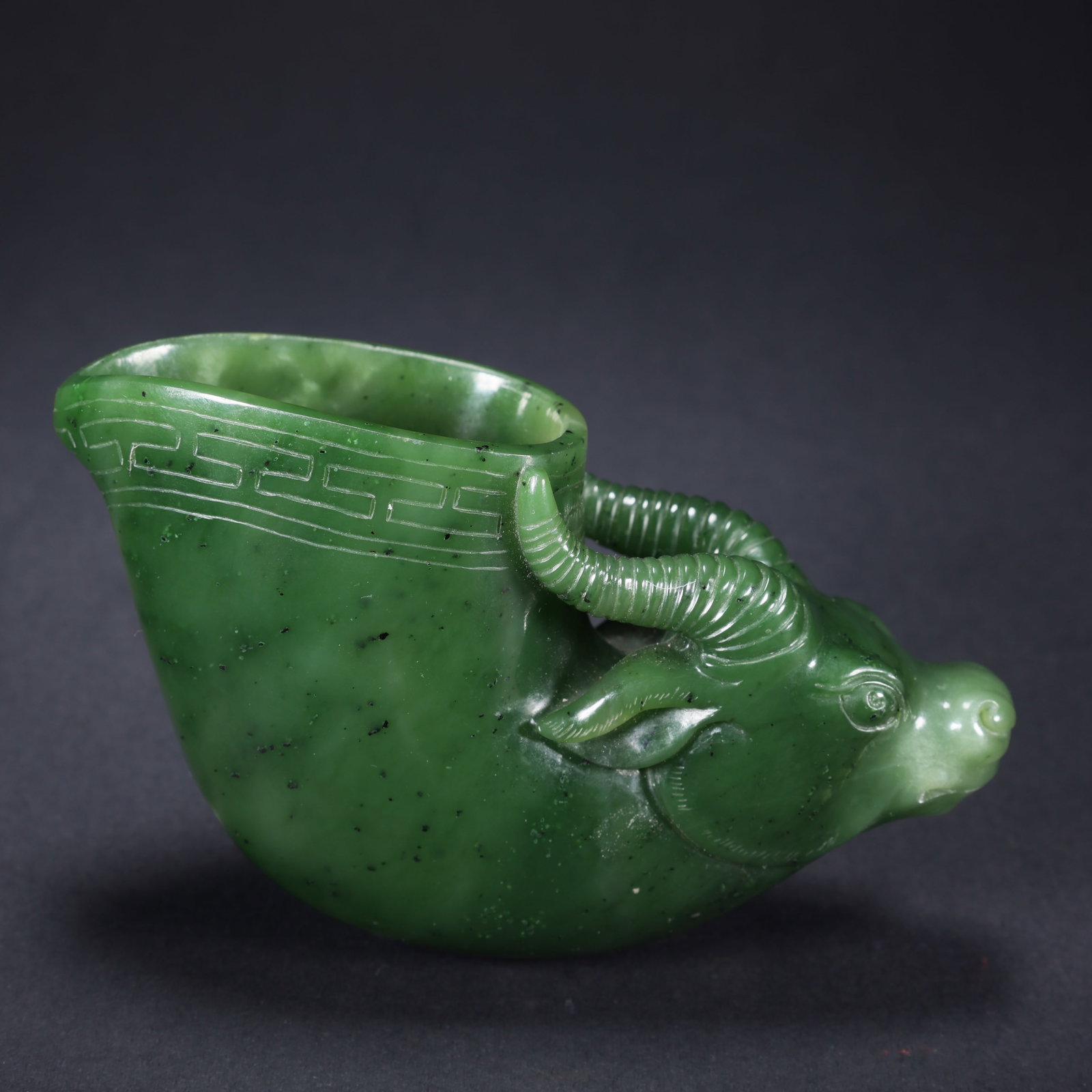 A HETIAN JASPER OX-HEAD CUP (1 of 9)