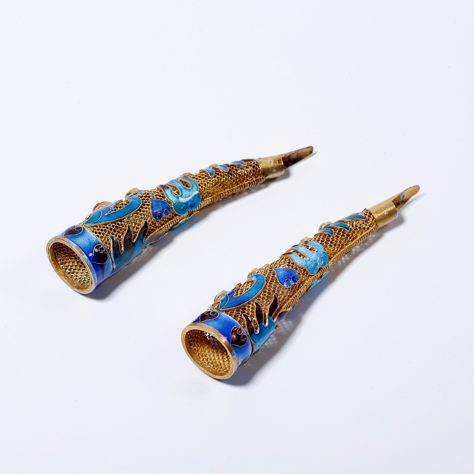 A PAIR OF GILT BRONZE NAIL GUARDS (1 of 9)