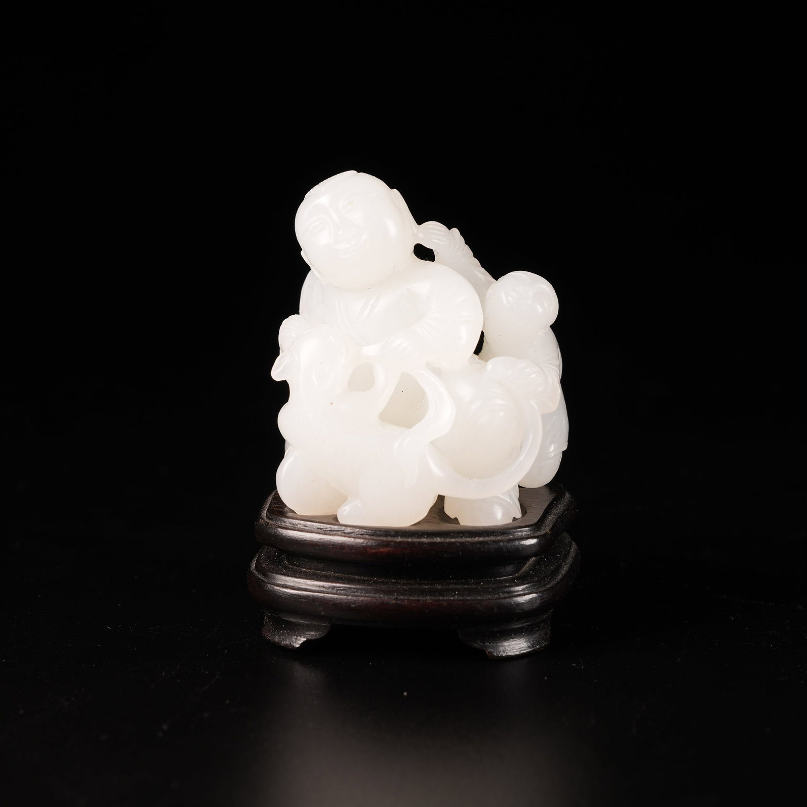 A HETIAN JADE PLAYING-BEAST BOY ORNAMENT (1 of 8)