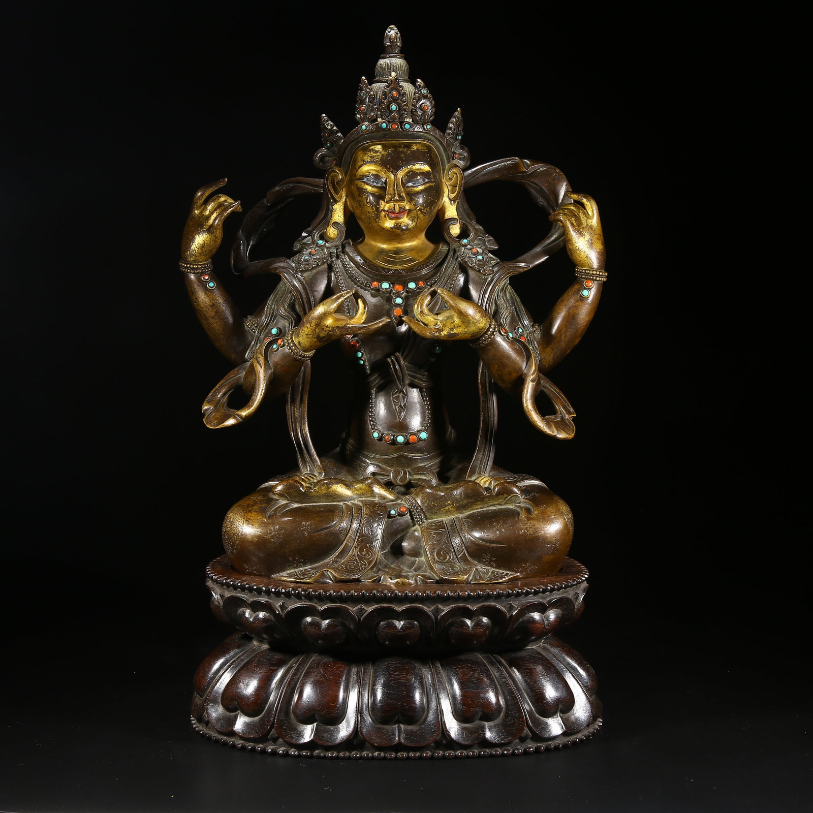 A GILDED BRONZE STATUE OF FOUR-ARMED VAJRAVARAHI (1 of 8)
