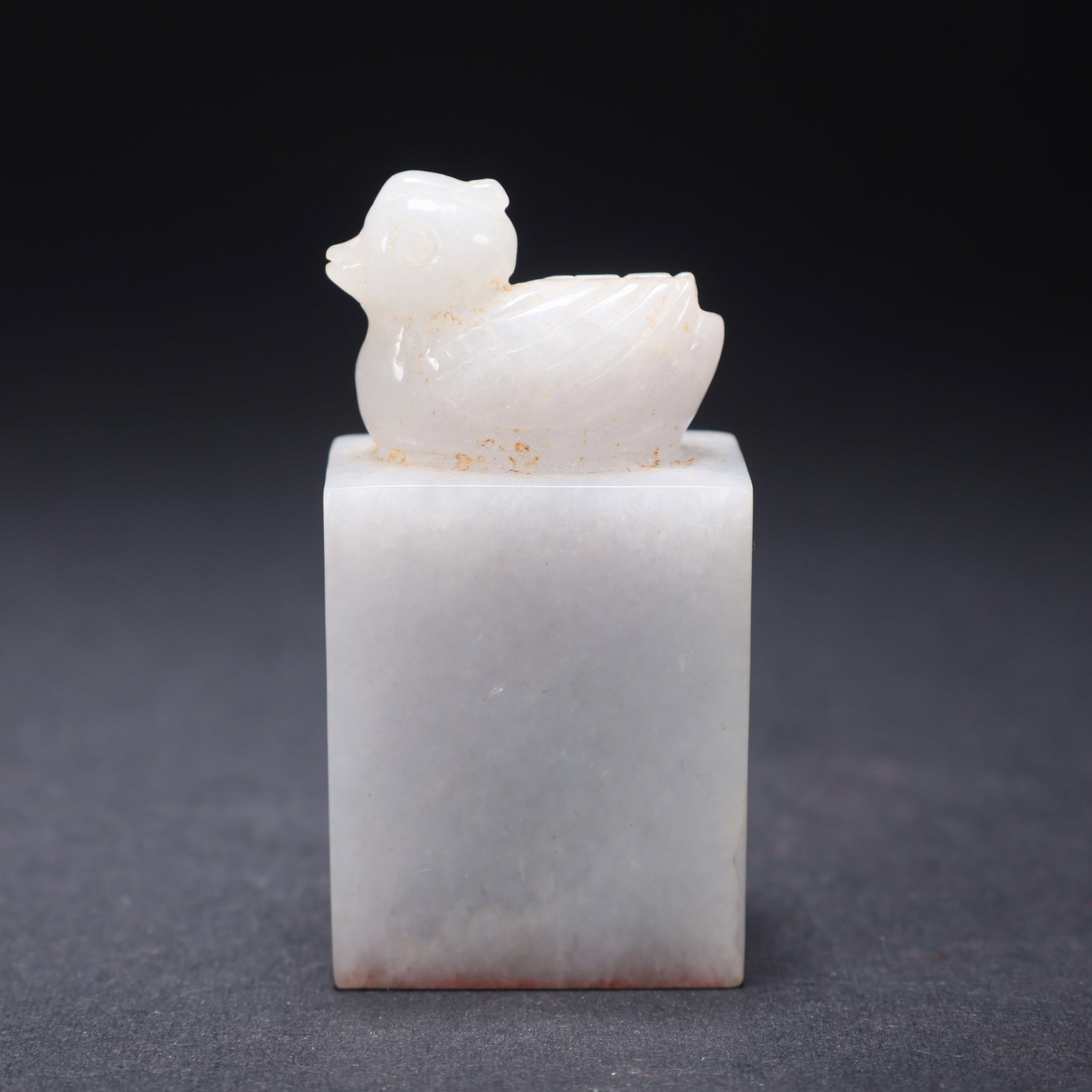 A JADEITE DUCK-HEAD KNOB SEAL (1 of 9)