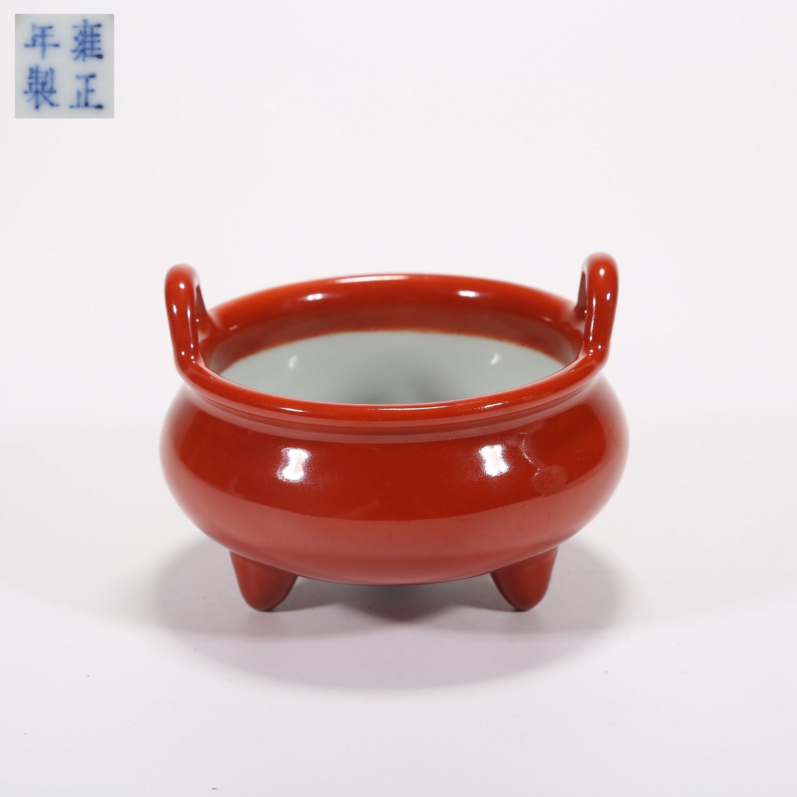A CORAL-RED–GLAZED TRIPOD CENSER WITH UPTURNED EARS (1 of 9)