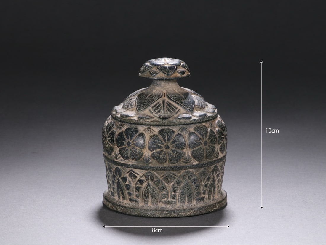 A TANG-DYNASTY BLUESTONE RELIQUARY JAR (1 of 9)