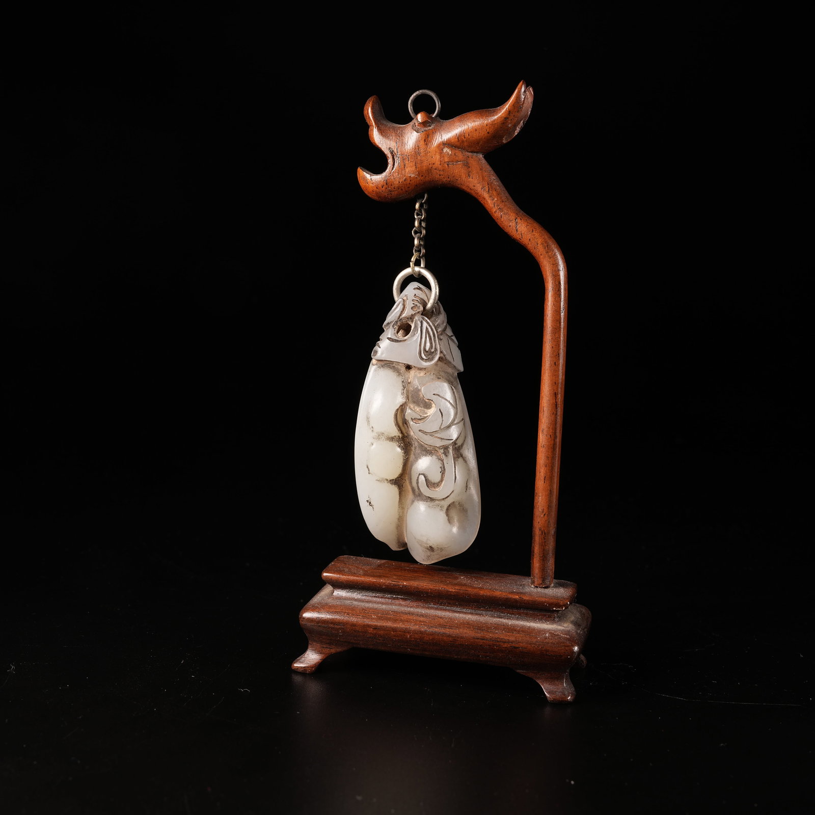 A HETIAN JADE GOURD-AND-FRUIT PENDANT: Hetian Jade Gourd-and-Fruit Pendant